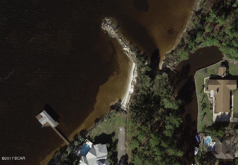 Beautiful waterfront lot with Bay access. Approximately 0.711 of an acre. Convenient to shops and schools in Lynn Haven area. The perfect lot to build that waterfront home you've always wanted. Property does have public water system access.