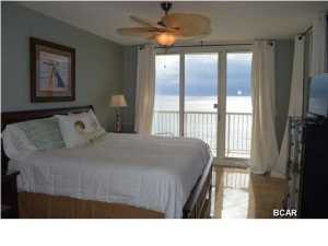 This End unit has been Completely Remodeled with lots of upgrades .It offers Four bedroom Three full baths, the owner spared no expense with this remodel. This condo offers one of the best unobstructed views on the beach. Fabulous westerly Views from the Master bedroom , guest bedroom, and the living room, dining/kitchen area. The guest bedroom on the North side has a private balcony and beach views. This condo is completely new from the Sheet Rock in. Fully furnished and Tastefully decorated with designer touches in every room. Beautiful porcelain tile through out .New light fixtures and ceiling fans. New hot water heater , A/C compressor, Dehumidifier, coastal green air system. Kitchen completely redesigned and improved.New Upgraded cabinets, Granite Counter Tops, designer back