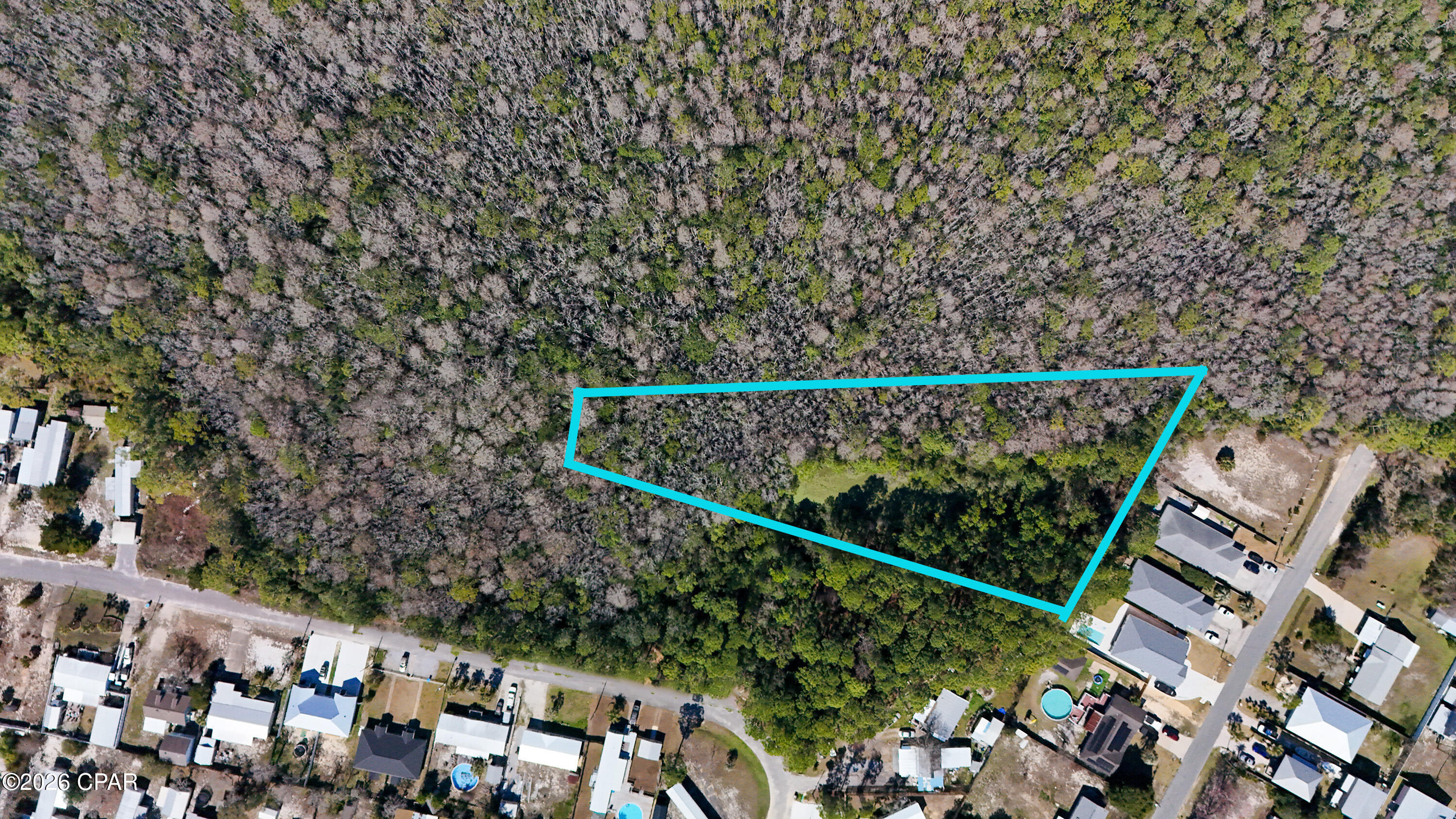 Prime PCB acreage just minutes from everything. Located less than 1 mile to the white sandy beaches and under 5 miles to Frank Brown Park, with quick access to 30A, this 1.65± acre tract on Malaga Place offers a rare opportunity to secure larger land near the coast. The property features  public water and sewer available at the street and is zoned R-2, allowing for single & multi family opportunities. 

Surrounded by established neighborhoods and ongoing development, this location supports a wide range of potential uses, including townhomes, duplexes, or a small residential project. Larger tracts in this area are becoming increasingly scarce as nearby acreage trades at premium coastal values.

Bonus opportunity: This parcel adjoins additional Malaga tracts that can be purchased separately or as a package for a combined ~3.7± acres, offering expanded development or investment potential.