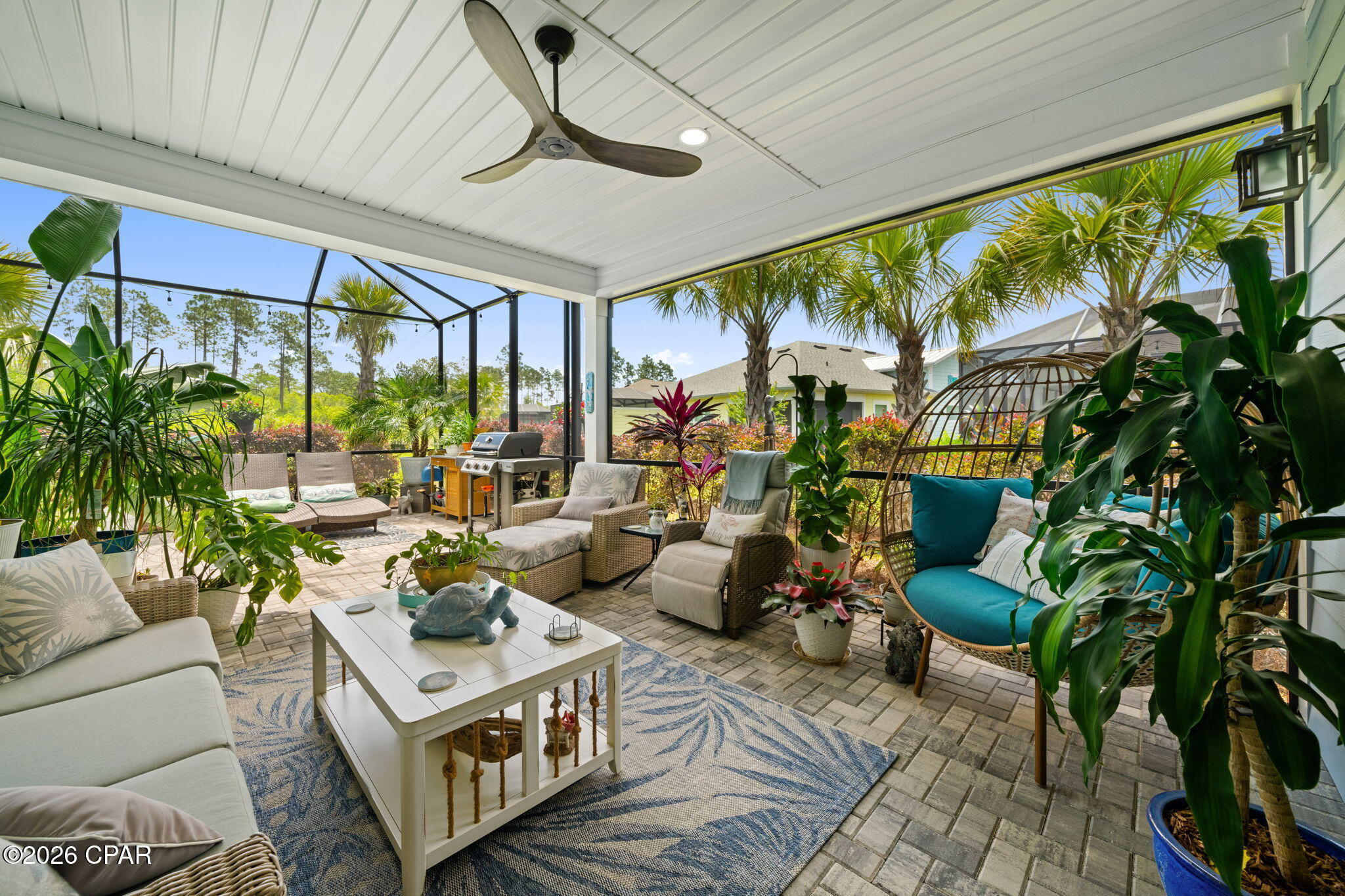 Stunning Nevis Caribbean Villa - Just 1.1 Miles from Latitude Town Square

This beautifully upgraded home features over $109,000 in builder options that are immediately apparent throughout.

Wide-plank laminate wood flooring flows through the majority of the home, complemented by elegant tile flooring in the bathrooms and laundry room. The gourmet kitchen shines with 42-inch cabinets accented by crown molding, under-cabinet LED lighting, and valances. Exquisite quartz countertops extend full-height as a backsplash, while the peninsula is finished with end panels, decorative trim, and stylish Margarita glass pendant lights.

The den has been thoughtfully converted into a private bedroom, complete with French doors, plantation shutters, and crown molding. The hobby room was also upgraded with Glass French doors. The primary bathroom includes the desirable builder upgrade featuring a large linen cabinet for ample storage.

Relax on the expansive east-facing covered lanai, enhanced with paver stone flooring, screening, and a soothing hot tub--ideal for year-round enjoyment.

Located in the heart of the 55+ Latitude Margaritaville Watersound lifestyle, this villa is only 1.1 miles from the vibrant Latitude Town Square. Enjoy world-class amenities including the Latitude Bar & Chill restaurant, the scenic Overlook Bar with panoramic Intracoastal Waterway views, the massive Paradise Pool with beach entry and Tiki Huts, live music at the Bandshell amphitheater, Fins Up! Fitness Center, pickleball and tennis courts, the Workin' N' Playin' Center with Last Mango Theater, and so much more.

The nearby West Bay Shopping Center is rapidly developing, with Golf Cart access to Electric Cart Watersound, Capital City Bank, West Bay Office Center, and upcoming additions like Grand Nail Lounge, Pizza by the Sea, and Publix.

Experience the ultimate in low-maintenance luxury and resort-style living. Schedule your private tour today!