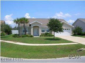 Beautiful home located on a quiet cul-de-sac. 3 bedroom, 2.5 bathroom also has a separate room that could be used as a office den. Close to Pier park and BEACHES!!!! Very nice community with community pool!!