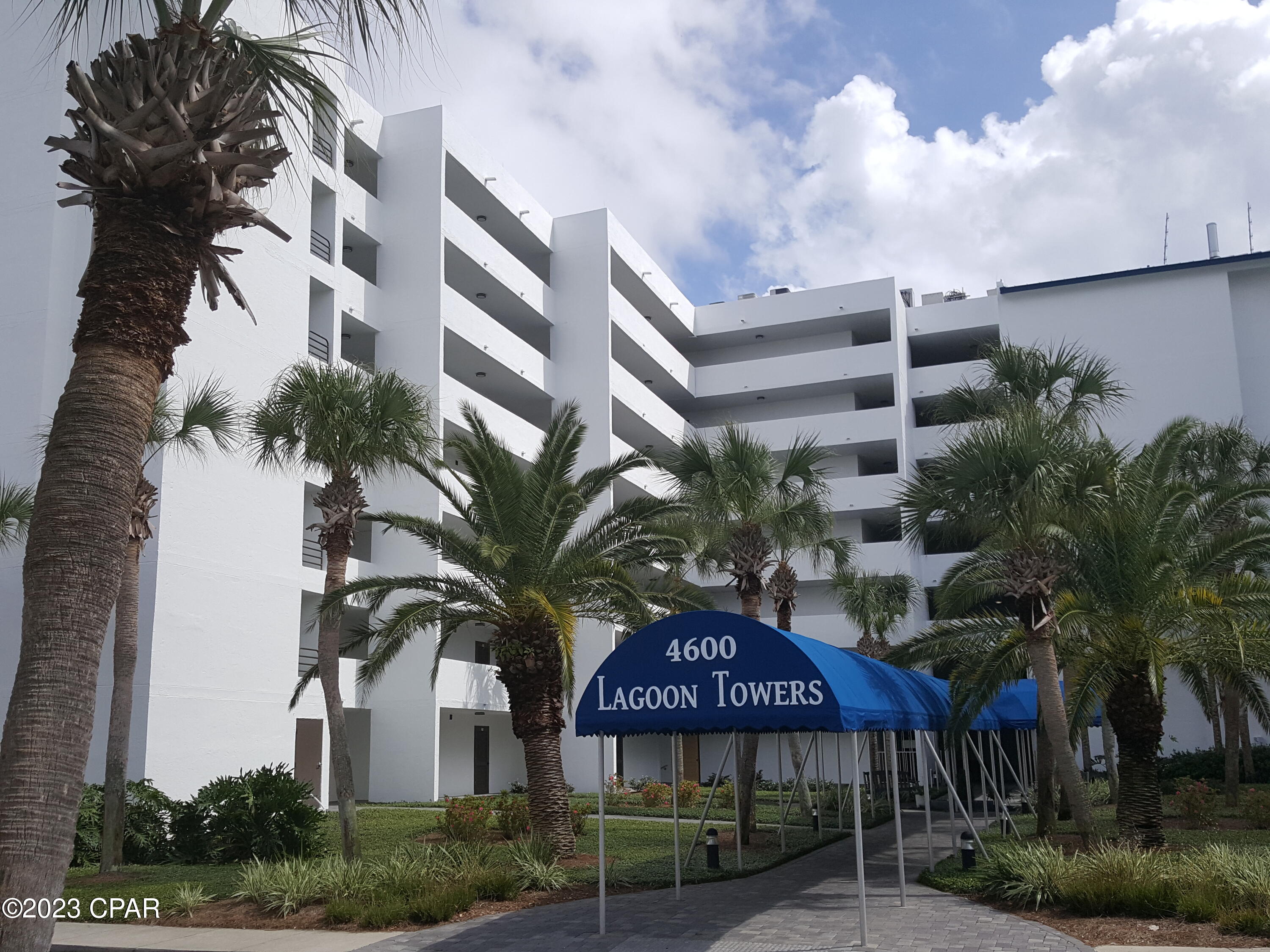 Welcome to the gated community of Bay Point.  Enjoy  coastal living with a waterfront pool & golf course to fill  your day with leisure. Perfect for boaters with a day dock for loading & unloading with boat storage nearby . Beautiful Shell Island & Pass to the Gulf are minutes from the dock. This 2 bedroom/2 bath condo is an end unit with sunrise & sunset views.  Boutique 63 unit complex in perfect location.  Become 1 of the lucky few to call this Lagoon Towers Condo - HOME!