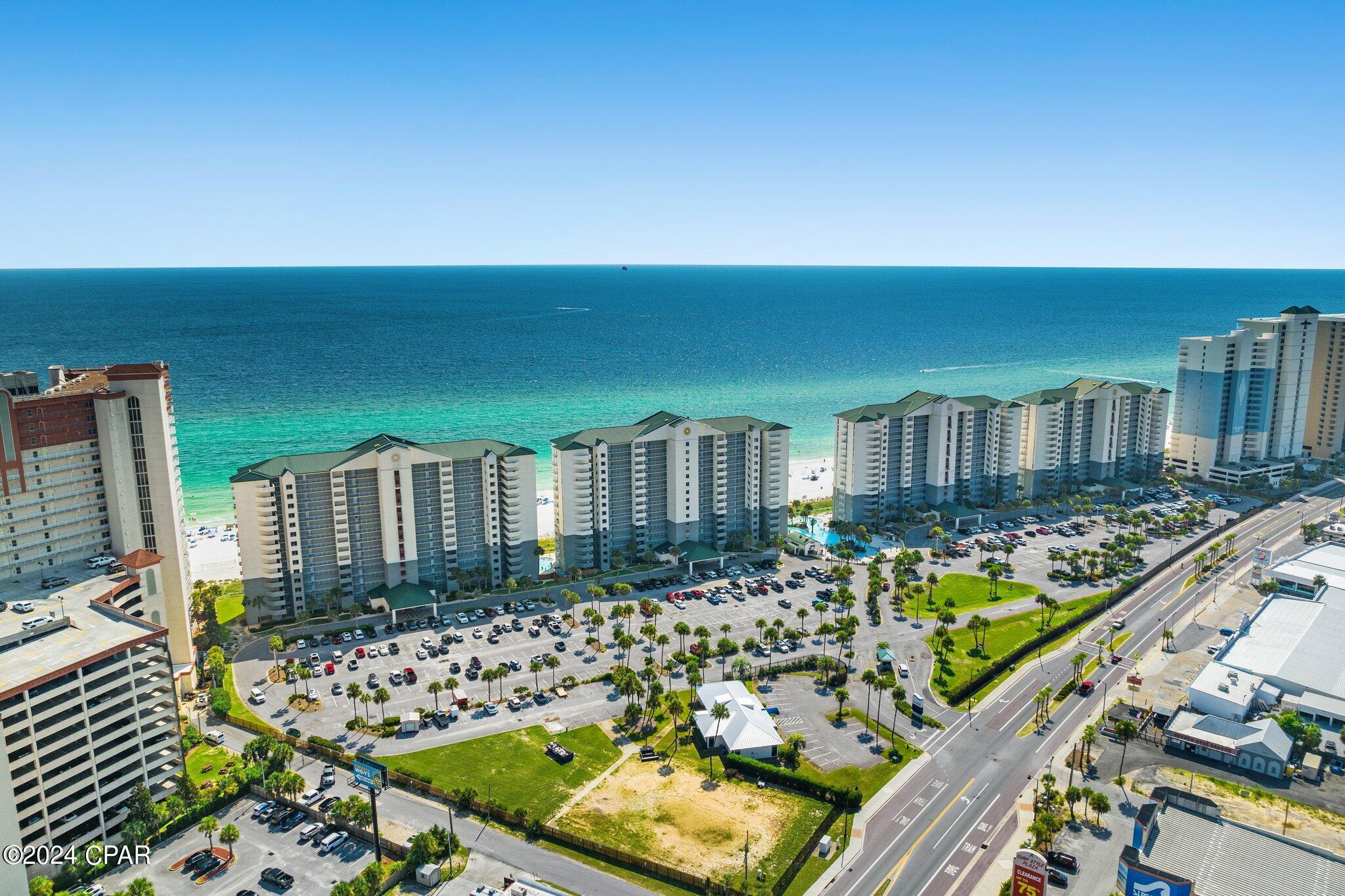 Welcome to Long Beach, Home of the most beautiful beaches in the World!  This penthouse end unit has a 30A inspired breathtaking feel with Gulf views from every room.  This spacious end unit features fully furnished 3BR/3BA with heavily upgraded furniture and décor, new cabinets, new quartz countertops, a new coffee bar, new appliances, and much more. The buildings at Long Beach are only 14 stories tall, which allows you to avoid long elevator wait times. Two gulf front master bedrooms, 1 with a king size bed and a master bathroom. The other master bedroom has its own private bathroom and 2 queen size beds both with floor to ceiling glass windows with access to a balcony for a nice sunset Gulf view. The third bedroom has two full size beds and a private gulf front balcony. All bathrooms have recently been updated. LONG BEACH RESORT features beautiful landscaped tropical grounds, a 7500 square foot lagoon pool with waterfalls and palm tree islands, two heated Polynesian pools, three whirlpool spas, poolside bar and grill, 1300 feet of powder white beach frontage 24 hour gated security. On site availability of beach chair & umbrella rentals, jet-ski, para-sailing, banana boat rides and more. Enjoy being close to the best local restaurants, entertainment, and shopping (including Walmart) and just a short drive to Pier Park. Short- and long-term rentals allowed. Contact your agent and schedule a showing today!