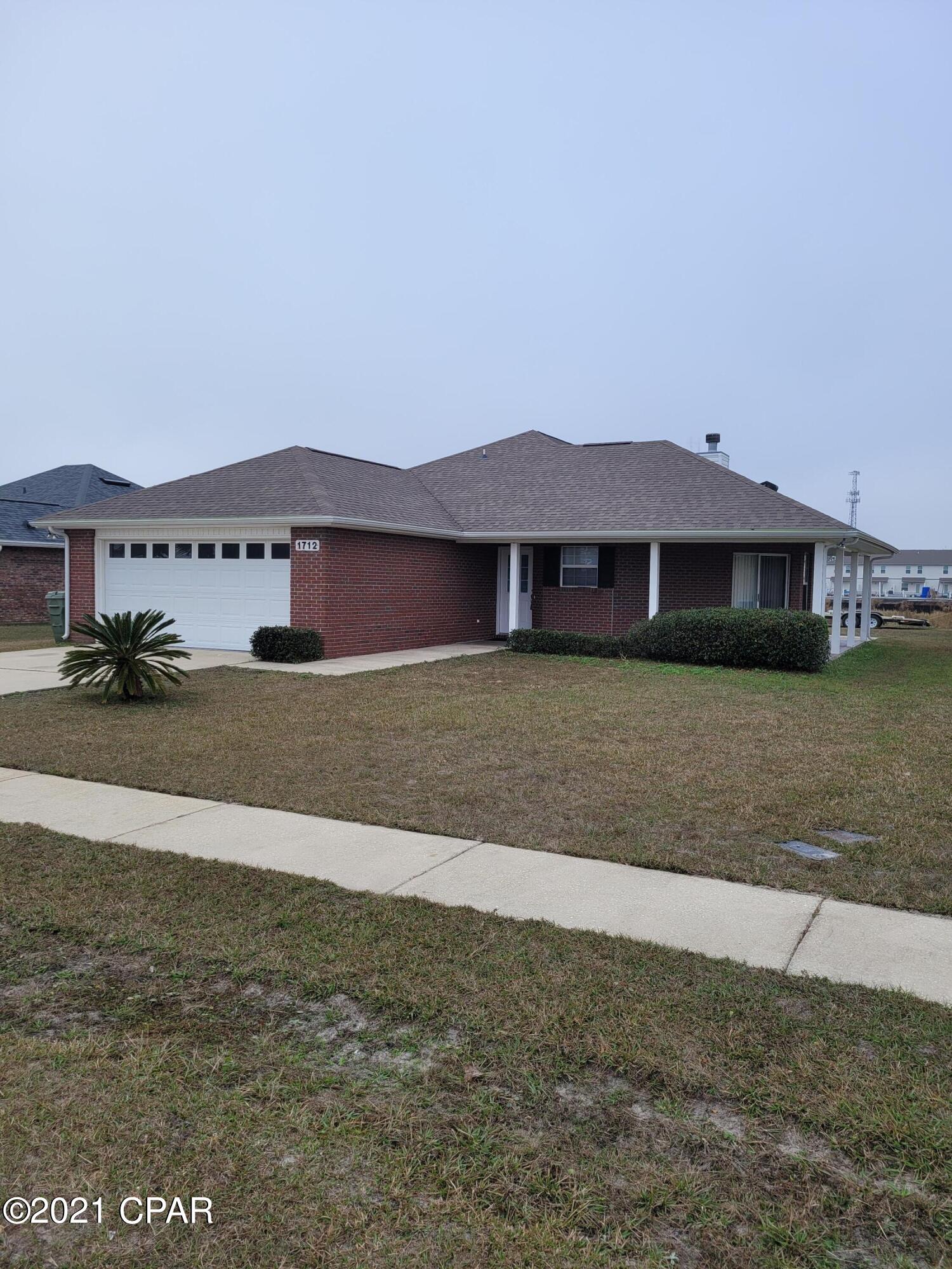 NICE 3 bedroom 2 bath home with 2 car garage!  this home features a wood burning fireplace, new stainless appliances, garage refrigerator ''AS IS'', new carpet and paint, trey ceilings, master bath with jacuzzi tub ''AS IS'', large porch that wraps around the side with a outdoor shower and enclosed back patio that has a ceiling fan.

Sprinkler system is on a separate water meter!

All Electric!

NO PETS!