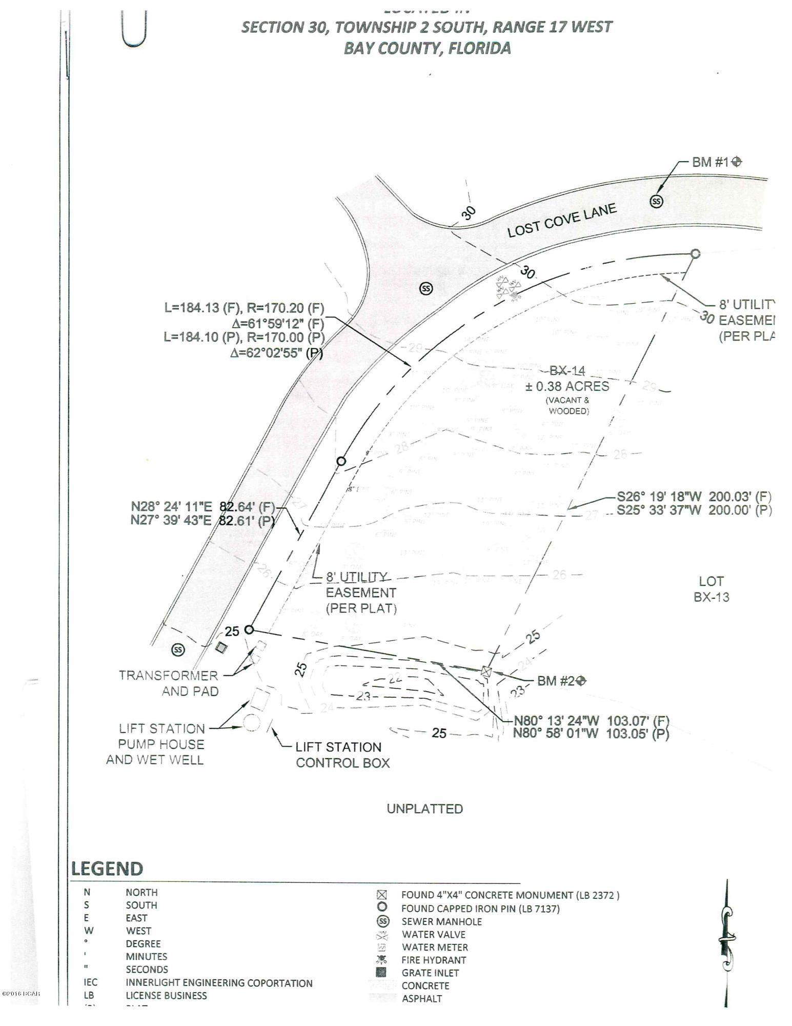 This is a GREAT deal on a building lot in the distinguished gated community of Wild Heron. Wild Heron is located on Lake Powell on the border of Walton and Bay counties. Golf memberships available at Shark's Tooth Private Golf Club.  Amenities include pools, hot tub, fitness center, boathouse with canoes and kayaks for owners use. This lot is required to have at least an 2200 sq. ft. house. Full survey and boundary stakes, trees, and topography provided. All information is approximate and should be verified by Buyer if important.