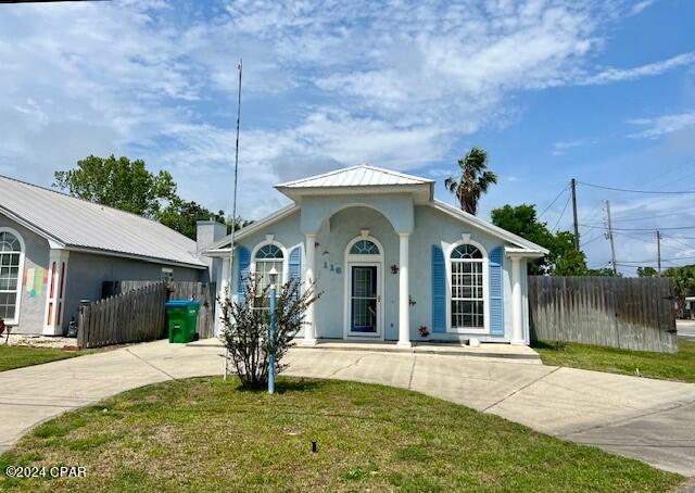 Welcome to this charming 2-bedroom, 2-bathroom single-family home located in walking or golf cart distance to the beach and Pier Park in Open Sands, Panama City Beach, FL. This gem of a property is perfect for those seeking a cozy haven with a flair of modernity and no short-term rentals allowed.

Key Property Features: As you walk into this 1,058 square feet sanctuary, you will be greeted with spacious open layouts bathed in ample natural light thanks to large windows that provide a lovely view. The home boasts contemporary lighting fixtures and elegant vinyl plank flooring throughout. The unit includes a washer, dryer, and garbage disposal, making your stay fuss-free and convenient. For your outdoor enjoyment the home is fully fenced with a private outdoor space stands ready for fun-filled BBQs.

Utilities and Amenities: Expect comfortable living all year round as this property is equipped with central heating and cooling, along with ceiling fans to ensure perfect temperature control. In addition, dedicated parking is a bonus for those with cars. Pet-lovers will be thrilled to find that the property is pet-friendly.

This home is not just about comfort but also about convenience. Situated near Walmart and several department stores for your daily needs is always nearby. Additionally, it is a short drive to Hutchison Beach Elementary, Surfside Middle School, and JR Arnold High School.

Act quickly - homes in this desirable location are snapped up fast! Start living the life you envisioned in Panama City Beach. Make this your new home today.
