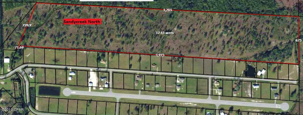 This 60 acre parcel is part of a larger parcel and will have to be surveyed out. The initial engineering planning has been started to add a phase III to Sandy Creek Airpark, named Sandy Creek North. This will add an additional 38 lots to the subdivision. And could offer the needed and asked for building of Hanger/condo, where as the hanger is on the first level, and the second level is the living quarters.  This type of subdivision would fill a need, for this Airpark. Also could fill the need for much needed apartments, additional land available for access.  Property does have wetlands but also has some elevations up to 12 ft.