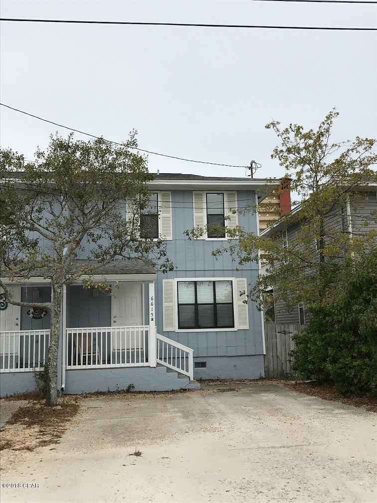 Just Two Blocks from the Beach. This is a 3 bedroom 1.5 bath town home located in the Thomas Drive area, and a short walk to the beach. This unit features a kitchen/dinette combo, covered front porch, 2nd level deck off of bedroom 2, and a small storage closet on the ground level.