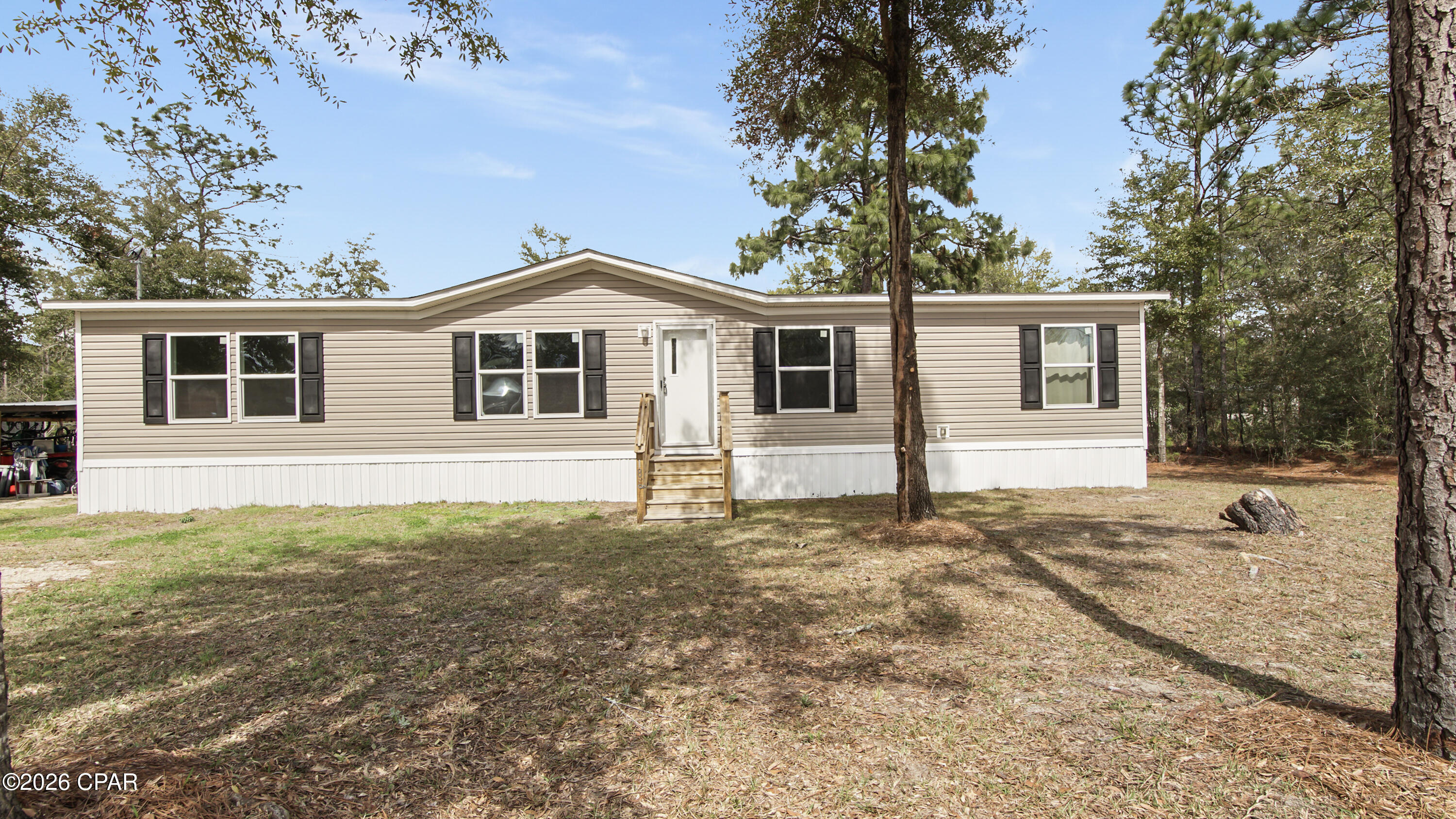 Welcome to 188 Pinetree Lane in DeFuniak Springs! This inviting 4-bedroom, 2-bath home offers the perfect blend of comfort and country charm. Step inside to a bright, open-concept layout designed for easy everyday living and relaxed gatherings. Durable vinyl plank flooring runs throughout the entire home, providing a warm look with easy maintenance.

The kitchen truly serves as the heart of the home, featuring a center island that's perfect for meal prep, casual dining, or enjoying your morning coffee. The four bedrooms offer comfortable, functional space with flexibility for family, guests, or a home office.

With peaceful surroundings and room to breathe, this home delivers the simplicity and charm of country living while still being convenient to nearby amenities. If you're looking for a place that feels welcoming from the moment you walk in, this one is a must-see. Schedule your private showing today!
