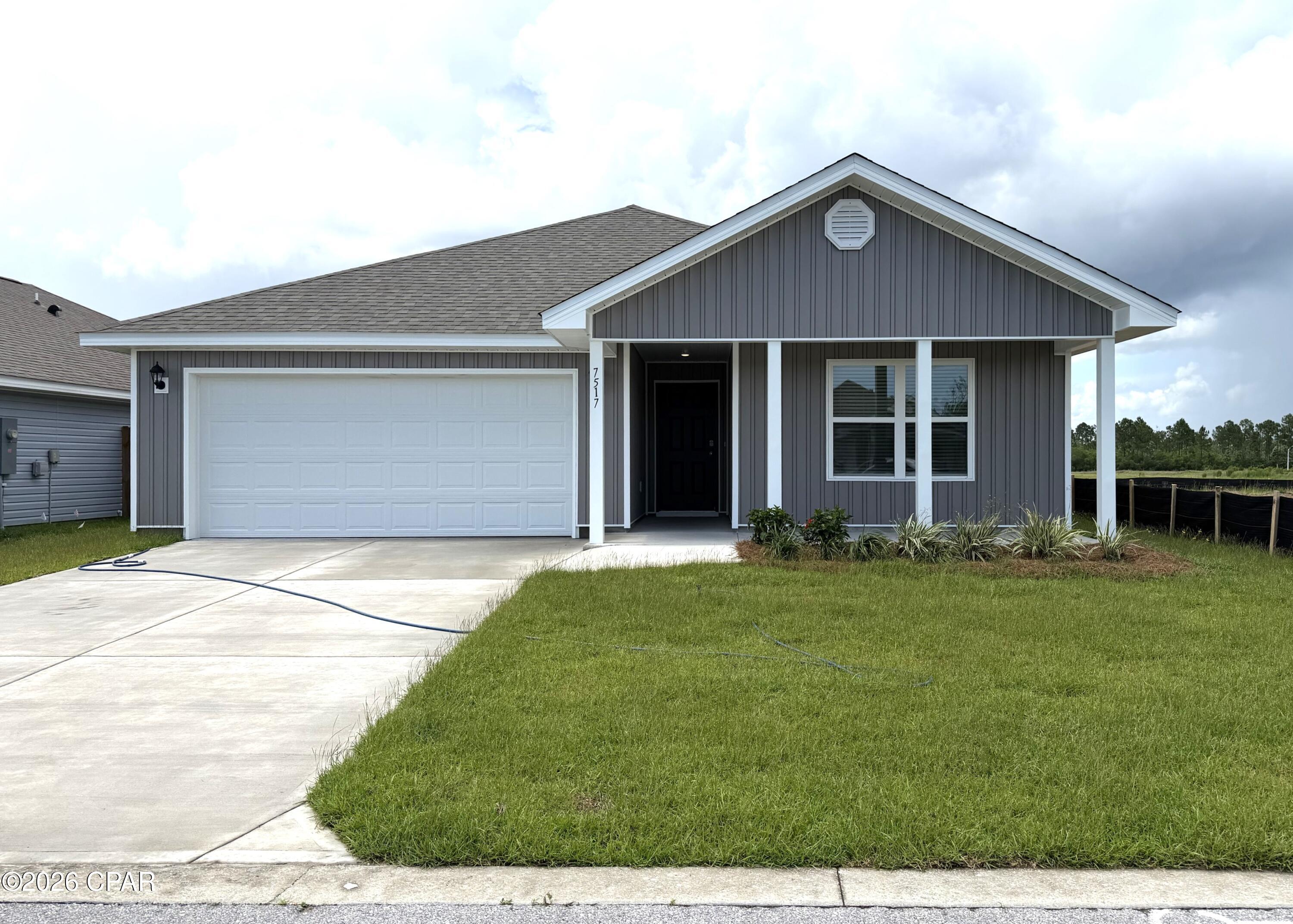 Welcome to the Ryder, a new home floor plan at Morningside in Panama City, Florida. The Ryder is a large open floor plan design complete with many features and space for you and your family. As you walk up to the home, you will be welcomed by the covered front porch and the spacious two-car garage. Around the house you will see durable vinyl siding all around, large yards at Morningside, and a large, spacious covered rear porch as well. Both porches have plenty of room for patio furniture to enjoy your day reading a book or watching those beautiful Florida sunsets.

As you walk inside the home, the guest bedrooms and guest bathroom with are located at the front of the home. Each bedroom comes with soft carpet floors and a spacious closet for clothing and storage. Further down the hallway is the garage and additional guest bedroom next to the laundry room. The hallway opens to the large open living room and kitchen leading to primary bedroom and backdoor. The kitchen has an island, a large pantry, and stainless-steel appliances. Next to it is the dining area with a double window next to the back door looking out into your covered rear patio and large back yard. The bathrooms and kitchen have beautiful white cabinets and granite countertops for modern style and durability. The large primary bedroom has soft carpet floors and plenty of space for a king size bed and furniture since the closet is in the primary bathroom. In the primary bathroom you will see beautiful EVP flooring and a double vanity with granite countertops as well as a walk-in shower.

The Ryder floor plan is a popular choice at Morningside. Schedule a showing to see it today!
