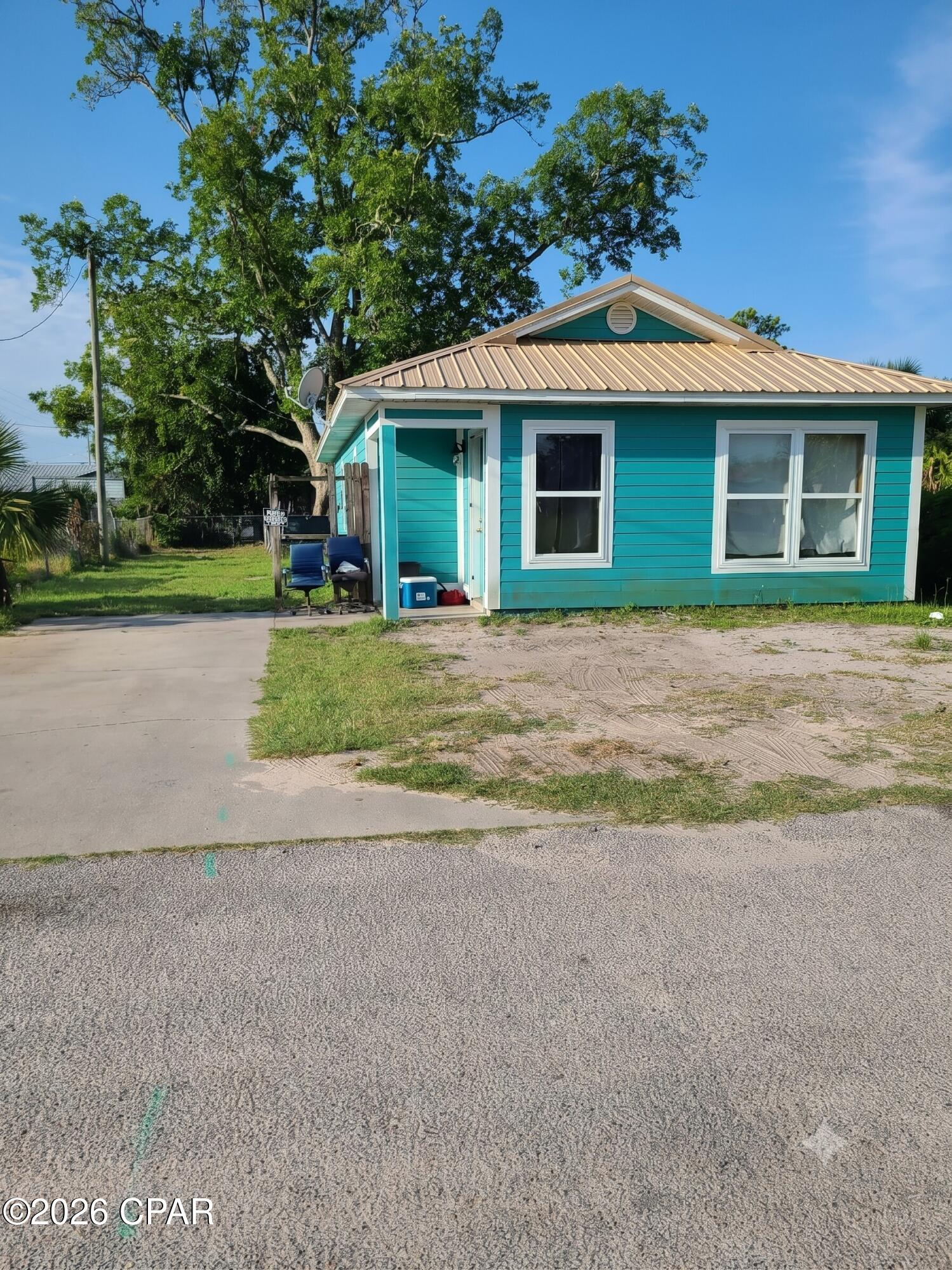AFFORDABLE COASTAL LIVING IN THE HEART OF PORT ST. JOE!  This 3-bedroom home offers a practical layout, comfortable living spaces, and an excellent opportunity to own property just minutes from everything that makes Port St. Joe such a desirable place to call home. Whether you're a first-time buyer, investor, or looking for an affordable primary residence, this property provides a solid foundation with room to make it your own.  Inside, you'll find the living and dining areas provide a comfortable setting for gathering with family and friends, while the kitchen offers ample cabinet storage and workspace for daily meal preparation. The three bedrooms provide versatility for family, guests, a home office, or hobbies, giving buyers the flexibility to make the space their own.  Step outside and enjoy the outdoor space, perfect for pets, gardening, weekend cookouts, or simply relaxing after a day on the water. With room for personalization and future improvements, this property offers a great opportunity to build equity while creating a home that fits your needs.  Conveniently located just minutes from downtown Port St. Joe, you'll enjoy easy access to local restaurants, boutique shopping, schools, parks, marinas, and St. Joseph Bay. Spend your weekends fishing, boating, kayaking, exploring community events, or taking a short drive to the beautiful beaches that make this area so special.  Whether you're searching for a primary residence, a long-term investment, or a long-term rental opportunity, this property offers value, convenience, and future potential in one of the Gulf Coast's most desirable small towns. With continued growth and demand throughout the Port St. Joe area, this home presents an excellent opportunity to establish roots, generate rental income, or add to your investment portfolio.  Call for your private tour & LIVE THE BEACH LIFE!