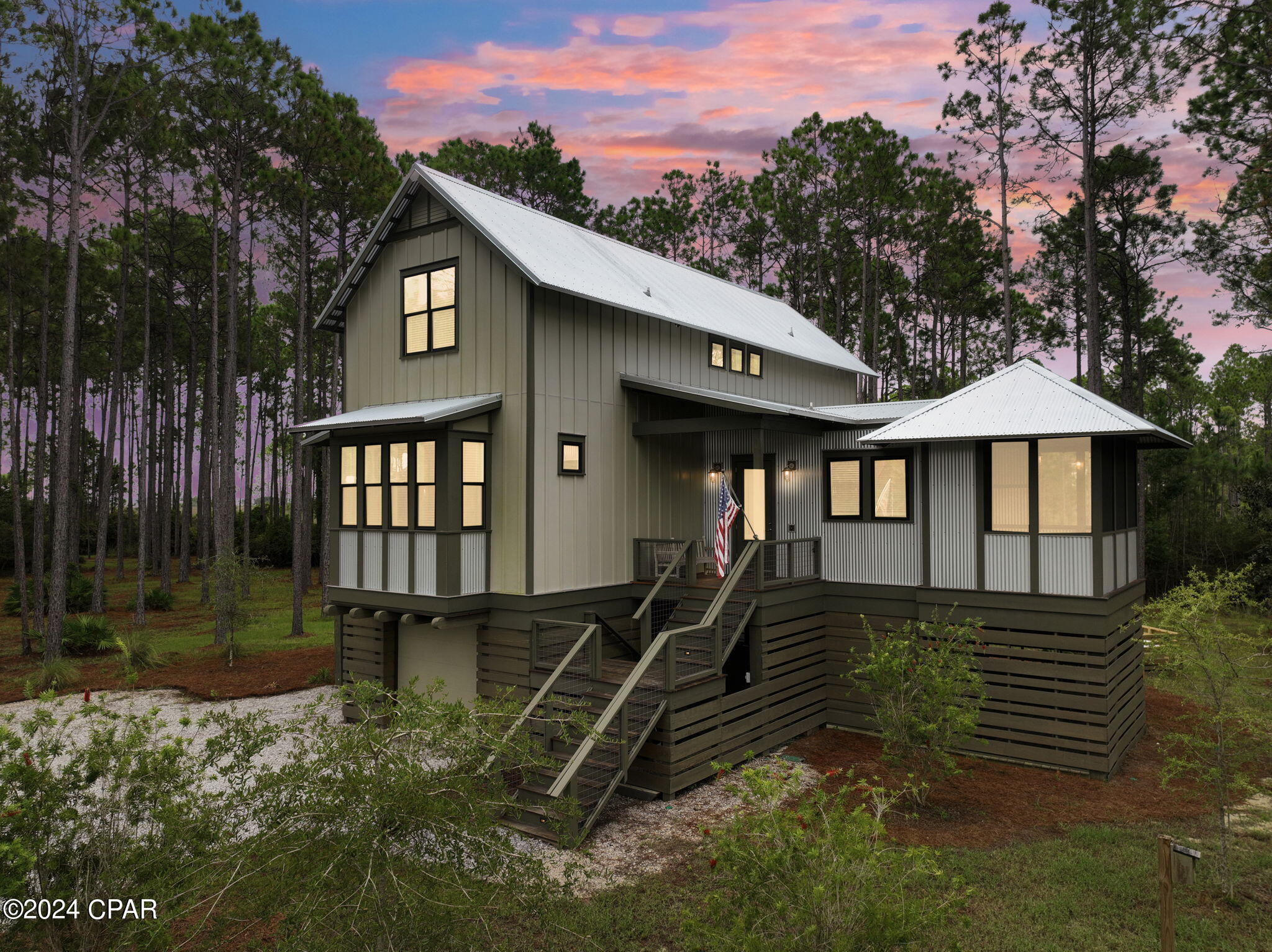 ''COMING SOON - NO SHOWINGS''

6501 Golden Aster Trail: Luxury Meets Adventure in Rivercamps with UPGRADES at EVERY CORNER!

The Lifestyle: Your 1,500-Acre Coastal Sanctuary

Living in Rivercamps on Crooked Creek isn't just about owning a home; it's about choosing an unparalleled Florida outdoor lifestyle where luxury seamlessly blends with nature. Encircled by water and pristine conservation lands, this exclusive, gated sanctuary offers a peaceful retreat from the everyday hustle while keeping you connected to everything you love.

- Waterman's Paradise: Launch your boat right from the community ramp. Spend your mornings winding through Crooked Creek, your afternoons fishing the open waters of West Bay, and your evenings making a run out to the stunning Gulf of Mexico. Grab a paddleboard or kayak from the community launch for a quiet sunset on the water.  

- The RiverHouse Amenities: The heartbeat of the neighborhood centers around the spectacular RiverHouse pavilion. Here, residents enjoy a zero-entry pool, a top-notch fitness center (coming soon), pickleball and basketball courts, and the highly anticipated, soon-to-be-built community center.  

-  Embrace the Outdoors: Explore over 7 miles of pristine walking, hiking, and biking trails that weave through the community's dense woods and scenic boardwalks. For an unforgettable evening, gather with neighbors or family at the unique owner's campsite for a night under the stars.  

-  Secluded Yet Connected: Enjoy the ultimate balance of absolute privacy and coastal convenience. You are just a short drive away from the world-class white sand beaches, upscale shopping, and fine dining of Panama City Beach and the iconic towns along Scenic Highway 30A.  

The Property: Exquisite Craftsman Comfort

Nestled on a generous, beautifully landscaped 0.64-acre interior lot near a quiet cul-de-sac, this modern 3-story Craftsman-style home (built in 2021) offers an elevated living experience--literally and figuratively. Designed on pilings to maximize the surrounding views, the home features 3 bedrooms, 4 bathrooms (3 full, 1 half), and 2,128 square feet of meticulously planned, light-filled living space.  

The Highlights:
-  Elegant Architecture & Modern Design: Rich hardwood, tile, and luxury vinyl plank flooring flow through a soaring, open-concept layout flanked by vaulted ceilings and recessed lighting. Move effortlessly between levels using the integrated home elevator.  

-  A Chef's Dream: The gourmet kitchen serves as the home's centerpiece, boasting a grand quartz center island, a premium propane cooktop with a sleek range hood, a walk-in pantry, and high-end stainless steel appliances.  

-  Serene Outdoor Living: Step out onto your private covered and screened porch spaces to enjoy your backyard oasis with peaceful, peek-a-boo bay views. An outdoor shower makes washing off the salt and sand after a day on the boat a breeze.  

-  The Master Retreat: Occupying its own dedicated space on the second floor, the expansive 17'x16' master suite is a true private oasis. It features a spa-like ensuite bathroom equipped with a double vanity and a massive separate shower.  

-  Unrivaled Storage & Parking: The ground floor features a colossal 54x18 attached garage and carport setup, providing 3 covered parking spaces and an abundance of room for your boat trailer, golf cart, paddleboards, and outdoor gear.  

Quick-Glance Property Details:
-  List Price: $1,049,000  
-  Square Footage: 2,128 sq. ft. ($462.88/sq. ft.)  
-  Year Built: 2021  
-  HOA Dues: $830.59 Quarterly 
-  Utilities: Underground utilities, public water/sewer, tankless water heater, and propane gas lines.  

-  School Zones: West Bay Elementary, Surfside Middle, and Arnold High School.