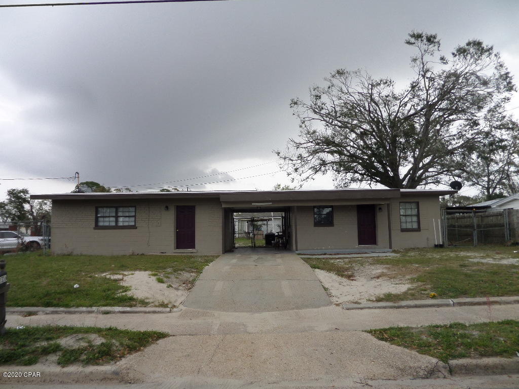 Reduced price.!!! This home is set up to live in and have a mother-in-law or student next door in the efficiency. Or if rented(at $400.00)  efficiency could bring income. Located near St. Andrews and downtown , Beach Drive(water)  main streets,  near school , area has sidewalks. Home is attached by a carport to the efficiency. There is also a private entrance  from 14th St with a covered parking space for efficiency.  The rear of property  is fenced  Some TLC needed  Please measure if  you need exact measurements