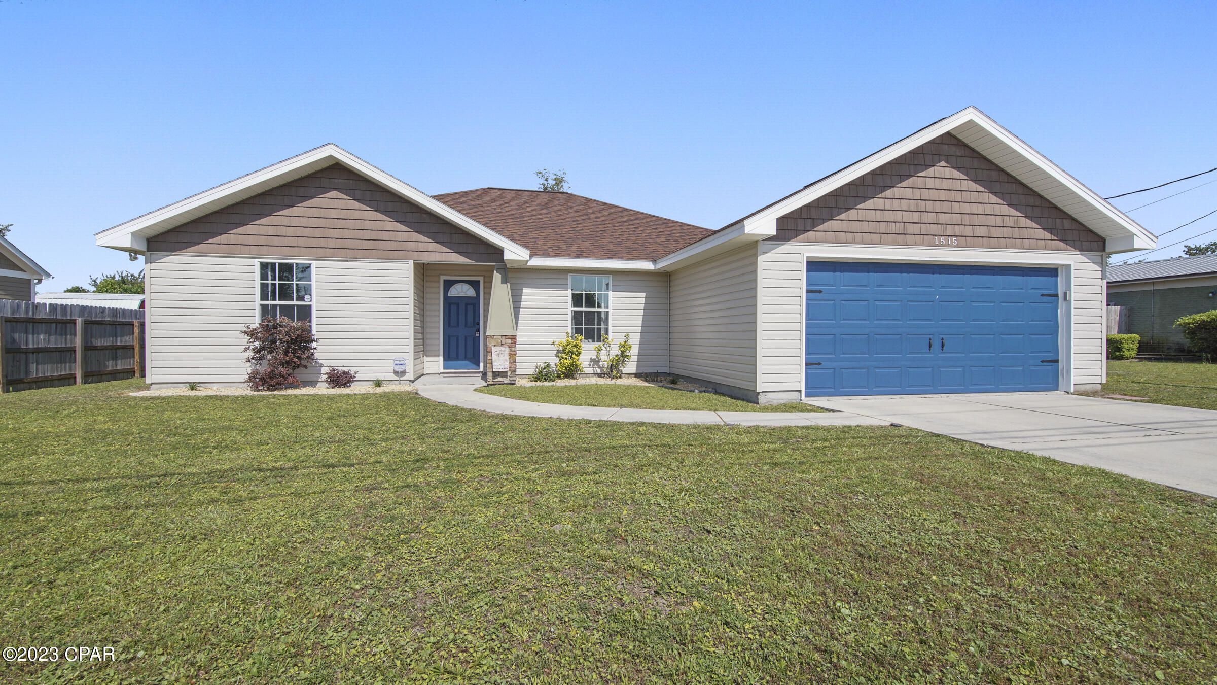 CURRENTLY UNDER CONTRACT, SELLER WILL CONSIDER BACKUP OFFERS. Beautiful and exceptionally maintained home in the very heart of Lynn Haven! Flood Zone X. When you walk in, you're greeted with a foyer leading into the open concept living room, kitchen, and dining room. The primary bedroom boasts lots of space and other 2 bedrooms are well sized and ready for your family to move in! The entire lot has a sprinkler system installed. The backyard offers a covered patio, new privacy fence and  fabulous outdoor chimney, perfect for your summer entertainment! Roof replaced in 2019, brand new plush carpet in 2020, and primary and secondary bathrooms have been updated as of 2020. This home is a must see and as an added bonus, is walking distance to Cain Griffin Park. Call your favorite realtor for a private showing today!