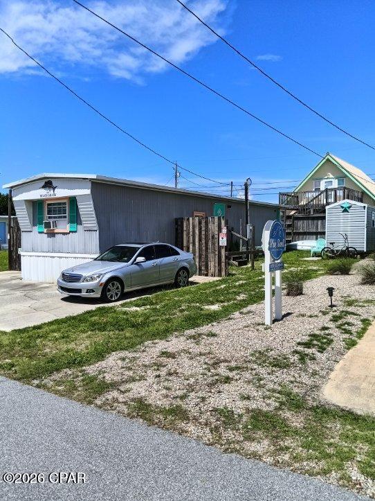 **Owner financing available with $50,000 down, $1,900/month at 7% interest, and a 7-year balloon payment. No credit check required**Located in the highly desirable Laguna Beach area of Panama City Beach, this property offers a fantastic opportunity to own an affordable beach getaway just under two blocks from the Gulf of America. Whether you're looking for a primary residence, second home, or potential vacation rental investment, this property offers flexibility and location.

Enjoy being just minutes from Pier Park, Frank Brown Park, and the shops and restaurants along Scenic Highway 30A. Thomas Donut & Snack Shop is within walking distance, making this location ideal for enjoying the laid-back beach lifestyle Laguna Beach is known for.

No HOA. Located in unincorporated Bay County. Buyers to verify all measurements, zoning, short-term rental requirements, and any information deemed important.