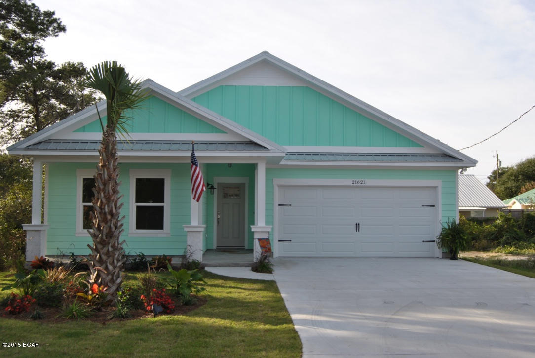 NEW CONSTRUCTION!  This beautiful cottage is just two blocks from the beach!  Custom features include:  quartz and granite countertops, crown molding, stainless appliances, pantry, subway tile back splash, slow close drawers, walk-in tile shower with rain head, trey ceilings, gateway wifi, sprinkler system and LUSH LANDSCAPING.
