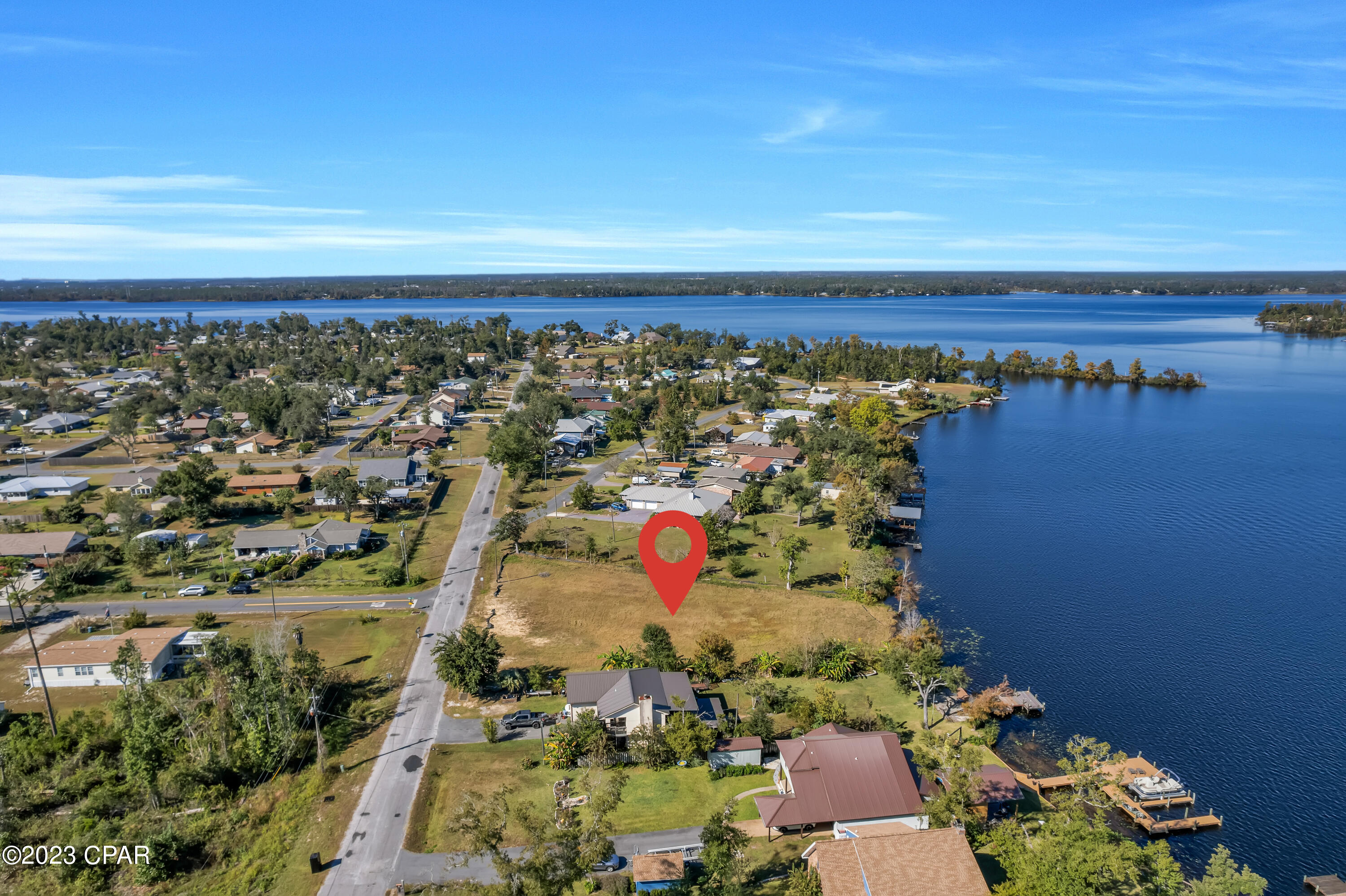 An exceptional opportunity to build your dream home on a cleared waterfront lot with 120 feet of lake frontage on beautiful Deerpoint Lake. Located in the highly sought-after High Point subdivision, this nearly one-acre parcel offers over 220 feet of depth, providing plenty of space for your custom design and room to enjoy stunning sunrise views over the water every morning.

Just around the corner, High Point Park features a kids' playground and two convenient boat ramps with ample parking—perfect for outdoor recreation and boating enthusiasts. Situated in Flood Zone AE8, this property includes a survey to help streamline your planning. Don't miss the chance to secure this prime piece of Panama City waterfront living!

All Information is deemed to be reliable, but is not guaranteed, buyer to verify if important.