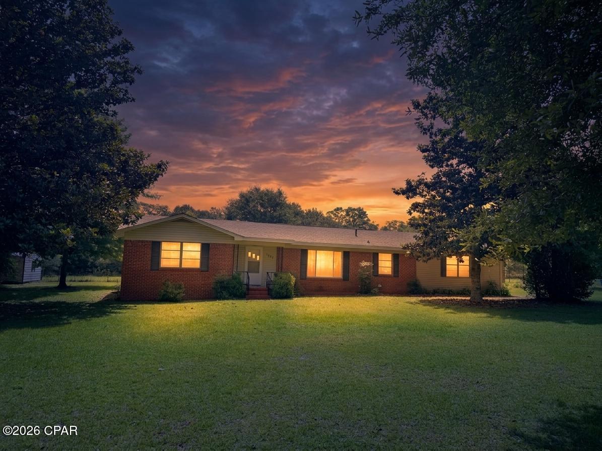Bring your horses and enjoy country living at its finest on this beautiful 5± acre property just south of Marianna, offering the perfect blend of comfort, functionality, and freedom with no restrictions!

This lovingly renovated 4-bedroom, 2-bath home is move-in ready with new flooring, fresh interior paint, and updated kitchen and bathrooms. The roof was replaced in 2019, providing added peace of mind. The versatile fourth bedroom offers flexibility and could easily serve as a second living area, game room, home office, or guest suite, with direct access to the back patio.

Step outside to a spacious covered patio overlooking the backyard--an ideal spot for relaxing, entertaining, or enjoying the peaceful surroundings. Additional improvements include a storage building with electricity for hobbies, projects, or extra storage needs.

Equestrian enthusiasts will appreciate the well-equipped horse facilities, featuring a 5-stall horse barn complete with tack room and storage areas, plus an adjoining round pen. The horse arena includes a dedicated viewing area, making it perfect for lessons, training, or events.

The property is fully cleared, fenced, and cross-fenced, with water available to each pasture from two wells, creating an ideal setup for horses, livestock, or other animals. With road frontage on two sides, access is convenient.

Enjoy the privacy and freedom of country living while remaining just minutes from town conveniences. This exceptional property is ready for you, your family, and your animals to call home!