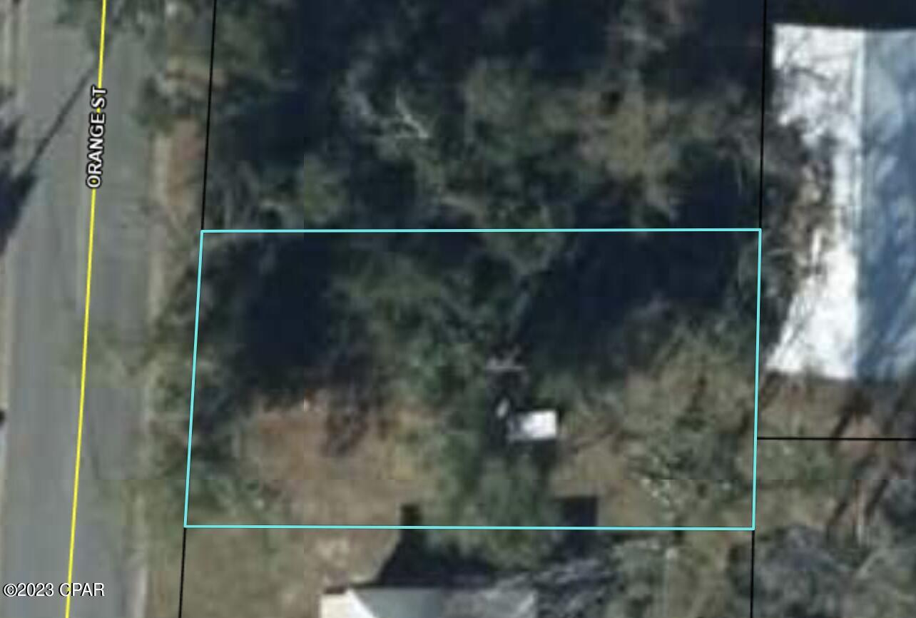 Own a lot on a busy street.  Wooded. Paved road frontage of 55 ft.  Many possibilities.  Bring all offers.