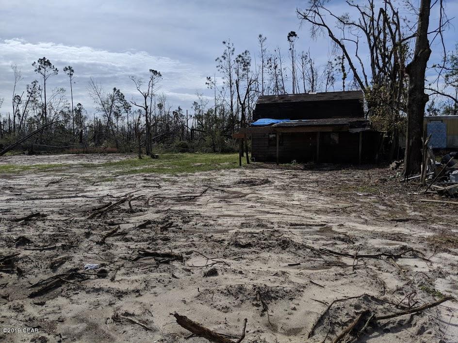 This is two lots for one price. Lot has City water and City Sewer, and electricity.Barn is still standing but house has been demolished.  Can build house or pull a mobile home in. Zoned for Mobile Home. Must see this Huge lot on dead end street today!