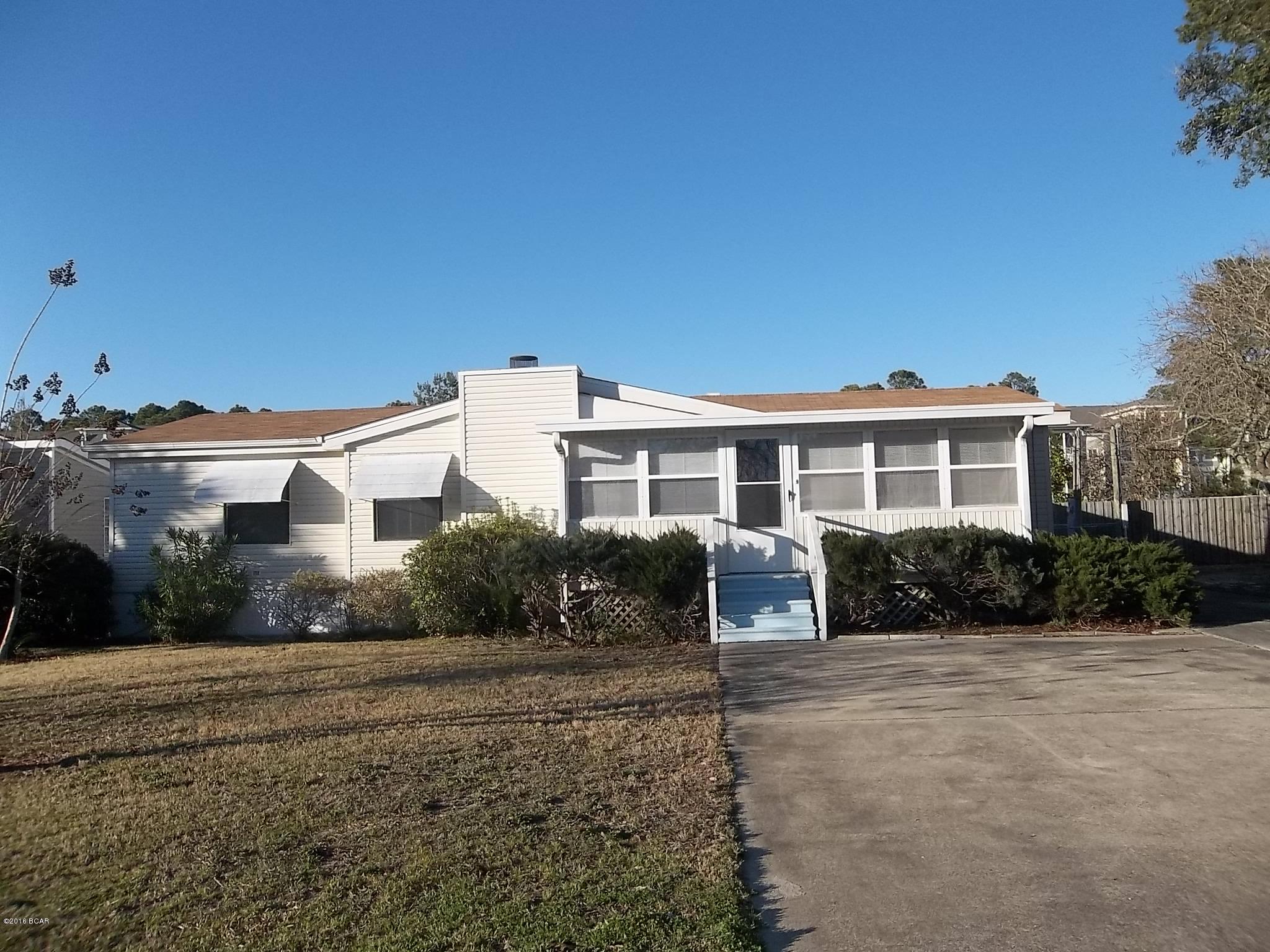 Awesome home close to beach.  3 bedroom 2 bath, new flooring, detached garage and storage building, fireplace, great for first home or second home.