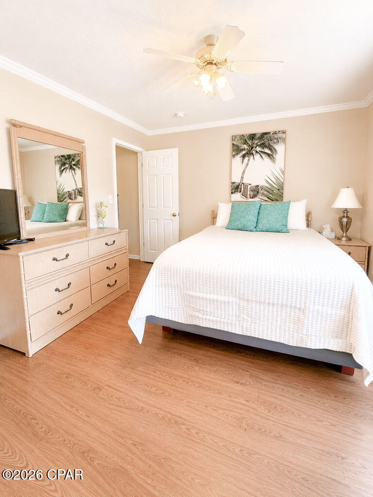 Welcome to Portside Condos! This 2 bedroom/1 and a half bathroom townhome-style condo is a turn-key property is ready to reel in the rental income. When you enter this home, you'll enjoy the open concept living, dining and kitchen space. The laundry is located on the main level along with a half bath. The kitchen is equipped with granite countertops and a beautiful tile backsplash. Upstairs you'll find two spacious bedrooms and full half bath. The primary suite features an awesome balcony off the bedroom! Out back, you'll love the storage closet perfect for storing beach toys and accessories right at your fingertips! Portside Condos is right across the street from public Beach Access 71! Portside is home to an abundance of amenities that include a kiddy pool, a spa (hot tub), one heated pool and two additional non-heated pools, tennis courts, and a clubhouse for owner/tenant use! Portside is also located on the West End of PCB, only minutes from shopping, dining, and the many other amazing attractions PCB has to offer. Come check it out!