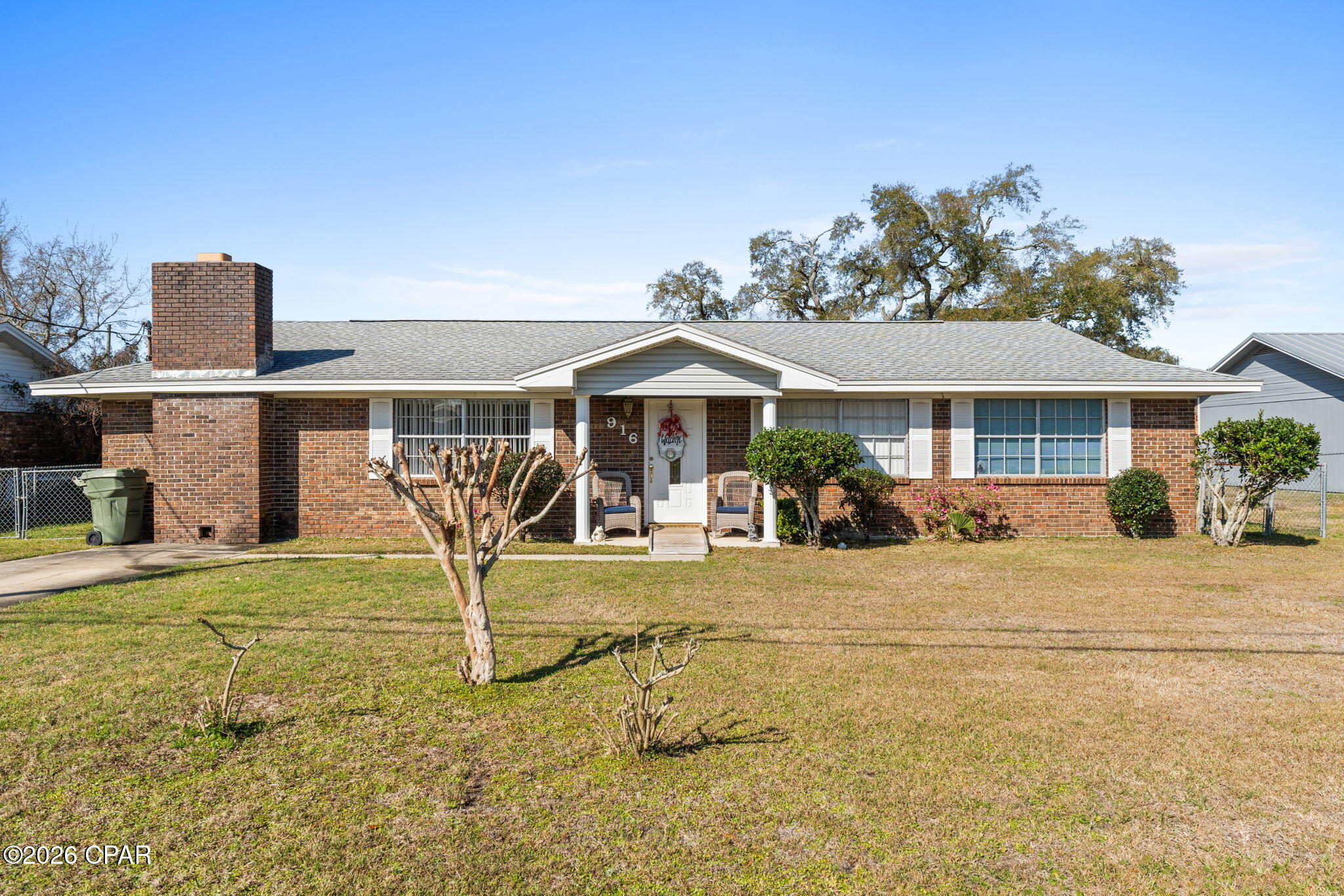CURRENTLY UNDER CONTRACT, SELLER WILL CONSIDER BACKUP OFFERS

Welcome to 916 Michigan Ave in the heart of Lynn Haven -- a well-maintained brick home offering space, comfort, and one of the most convenient locations in Bay County.

Situated on a generously sized lot just minutes from top-rated Lynn Haven schools, parks, grocery stores, restaurants, and the bay, this property offers the kind of everyday convenience buyers are looking for. You're also just a short drive from Panama City, Tyndall Air Force Base, and the beaches of Panama City Beach, making this location ideal for commuters, military families, or anyone wanting quick access to everything the area has to offer.

Inside, you'll find a bright, open living area with updated flooring that flows easily into the dining space and kitchen, creating a comfortable layout for both daily living and entertaining. The kitchen features granite countertops, stainless appliances, classic white cabinetry, and a breakfast bar perfect for morning coffee or casual meals.

One of the standout features of the home is the large additional living space with a wood-burning fireplace, offering the perfect spot for a game room, second den, or cozy retreat. Whether you're hosting friends, watching the game, or just unwinding at the end of the day, this space adds versatility and character.

Step outside to enjoy the spacious backyard with plenty of room to spread out. The covered back porch provides a great place to relax while overlooking the yard, and the detached shed/workshop and covered storage area give you plenty of room for tools, hobbies, or outdoor equipment.

Solid brick construction, flexible living spaces, and a prime Lynn Haven location make this property a strong opportunity for new homeowners, downsizers, and investors alike.

If you've been looking for space, functionality, and a location that keeps you close to everything, this one deserves a spot on your list. Schedule your tour with your preferred Realtor, or call to get connected to someone today!