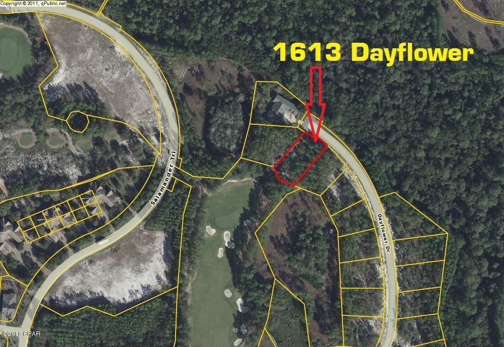If you like upscale resort style living, you'll love this affordable lot along hole #8 of the highly acclaimed Greg Norman, Sharks Tooth golf course.  Wild Heron is a gated community located at the border of Northwest Florida's Walton and Bay Counties. Wild Heron sits directly on Lake Powell, one of the region's largest coastal dune lakes. Coastal dune lakes exist as a natural estuarine transition between the Gulf of Mexico and inland areas. Amenities include Shark's Tooth Golf Club, Har-Tru Hydrocourt Tennis Courts, a lakeside grill and fire pit, community swimming pool, fitness center, boardwalks, trails and parks. The Boathouse at Prospect Point includes a dock for access to Lake Powell and is well stocked with kayaks and canoes for residents' use. Centrally located 2 miles from Rosemary Beach and 30-A area, approximately 7 miles to Pier Park and close to the beautiful white sandy beaches and emerald waters of the Gulf of Mexico.  This lot is everything you could ever want in building your dream home.  A set of preliminary plans are included as well as a boundary and tree survey.  Call today and make your offer.  All data and dimensions should be verified by the buyer.