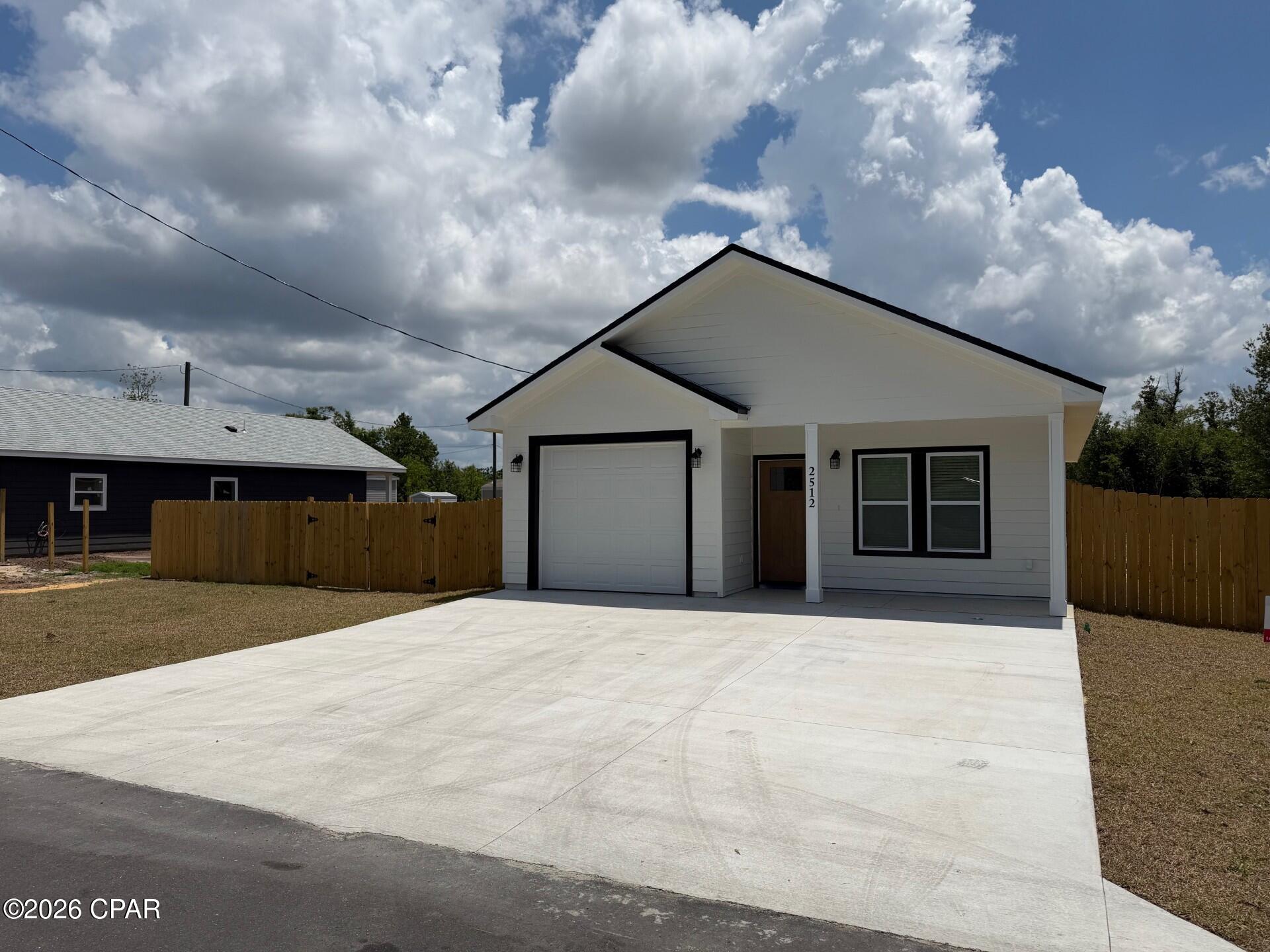 NEW CONSTRUCTION HOME!! This beautifully crafted new construction home offers 3 bedrooms and 2 bathrooms with quality finishes throughout. Situated on an oversized lot, the property features a fully privacy-fenced backyard with double gates on both sides for added convenience and accessibility. Inside, you'll find durable luxury vinyl plank (LVP) flooring throughout and a flowing open floor plan that seamlessly connects the living and dining areas to the stylish kitchen, complete with an island breakfast bar perfect for entertaining. A covered rear patio overlooking the spacious backyard will be added soon, creating the perfect outdoor retreat.