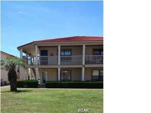 This is a Beautiful 1 bedroom with, 1 1/2 bath furnished condo. Close to the pool and a short walk to the beach access . Open Floor Plan nice porch on the back of the unit. There are 4 community pools to enjoy. INCLUDES WATER,SEWER,TRASH,PEST CONTROL AND BASIC CABLE.**Furnished ** Showings by appointment only ** Call our office **