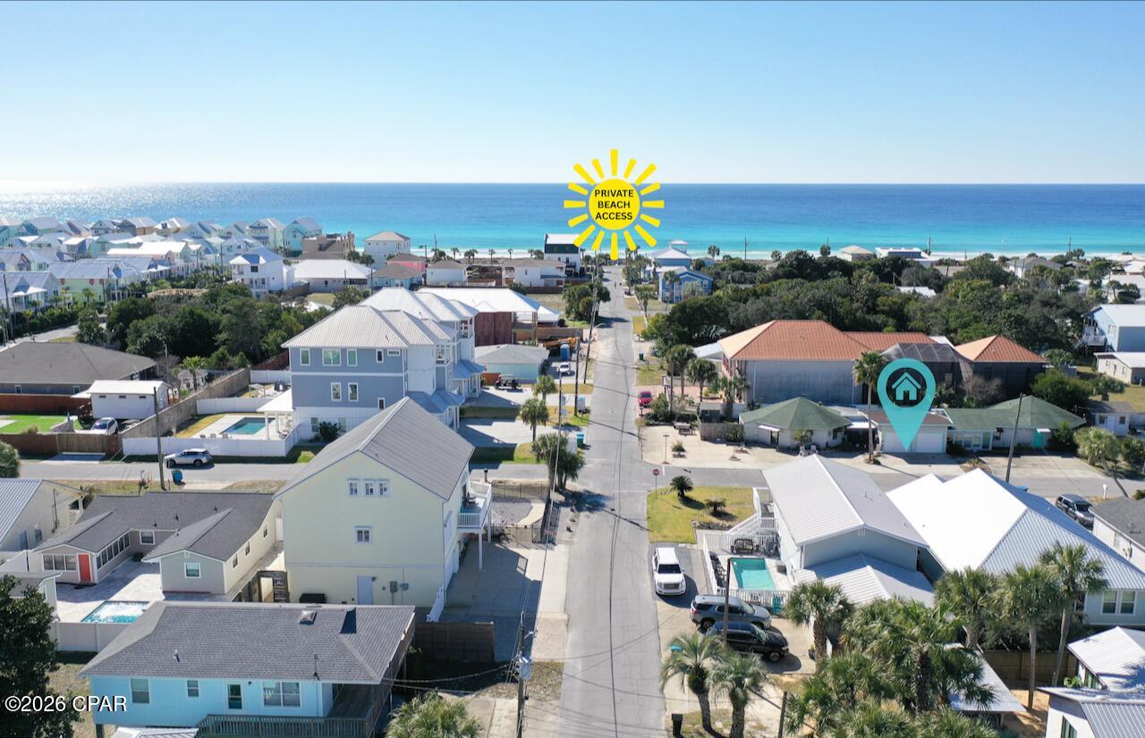 A rare opportunity in the heart of Bid-A-Wee, one of Panama City Beach's most coveted neighborhoods and the only beach community along PCB's 26 miles of sugar-white sand offering private gated deeded beach access. The property is ideally located within a limited section of the neighborhood where SHORT-TERM RENTALS ARE PERMITTED, making it an exceptional find! This unique property sits on one parcel and features two separate residential units, offering exceptional flexibility for homeowners and investors alike. Whether you live in one unit and rent the other, or maximize income by renting both, the options here are hard to find -- especially this close to the Gulf. The primary residence at 13801 Bay Avenue offers approximately 1,200 square feet with 3 bedrooms and 2 full baths, featuring recent interior updates including the kitchen, living areas, bedrooms, bathrooms, and updated flooring. A sunroom/breezeway connects the home to a two-car garage and opens to a private fenced backyard complete with a covered grilling patio and open deck -- ideal for outdoor living. The second residence, identified for mailing purposes as 500 Albatross Street, offers approximately 1,100 square feet with 3 bedrooms and 2 full baths in an open-concept layout. This unit includes a covered front porch, fenced backyard with gated access, and its own garage connection, providing privacy and functionality for guests or tenants. Both units feature laundry rooms, separate entrances, dedicated garage space, and ample parking, including room for a boat or additional vehicles. With a three-minute walk or 30-seconds in a golf cart to the Gulf, owners may opt into the Bid-A-Wee HOA for a nominal annual fee, granting access to the gated beach entrance. Centrally located near Pier Park, dining, shopping, entertainment, and nightlife, this property delivers the perfect balance of beach lifestyle, neighborhood charm, and income potential. **FLOOR PLANS in Photos** Dimensions approximate, please verify if important.