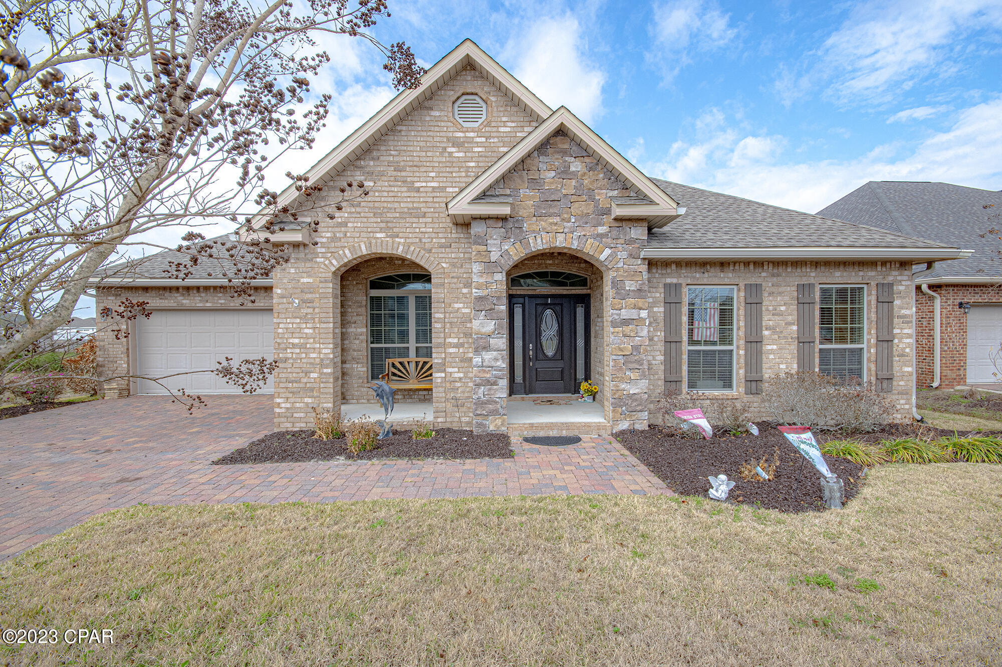 Exceptionally well maintained home in beautiful Cedar Branch Subdivision, gated community that features underground utilities.  This lovely 5 bedroom 3 bath home has it all.  Spacious floor plan is perfect for entertaining.  The Engineered hardwood floors are amazing. On 4/30/2023 the sellers had the hall, living room and dining room replaced with an Ultra - Premium VLT flooring.  In addition there was ample use of oversized tile used in the kitchen, breakfast area and bathrooms.  Cabinets galore along with a huge island in the gourmet kitchen with stainless steel appliances, exquisite granite counter tops and large walk in pantry.  Master Bedroom has access to the Florida Room that is heated and cooled. Nice open deck off the Florida Room, great for outdoor cooking. Sep. meter for the sprinkler system.  Storage shed.  Call your favorite Realtor to see this beautiful home.