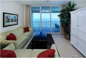This is the ONLY 2-bedroom unit available at Palazzo and it will not last long! Being on a lower floor, you can hear the soothing sound of waves from your balcony. Although unit #203 is located on the 2nd floor, it has an approximate 6th floor elevation due to the four levels of parking under the building. This is a beautiful fully furnished Gulf front unit with a Gulf front master bedroom, guest bedroom, two bathrooms and an additional bunk room. Enjoy the open floor plan, crown molding and raised ceilings. The floor to ceiling windows & glass doors truly maximize the Gulf views. The glass sliders are very high quality with tinted glass. There are 18'' tile floors in the entry, kitchen, living area and bathrooms and carpet in the bedrooms. The kitchen has beautiful granite countertops