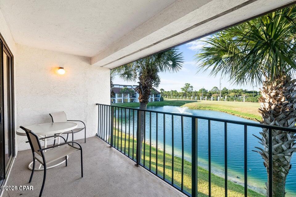 2 bedroom condo and FREE GOLF for life... It simply doesn't get any better than this!!! Are you someone that enjoys the finer things in life? Someone who loves unbelievable sunsets, peaceful and serene water views, a nature wrapped backdrop that is second to none, and unlimited golf on your very own executive 9 hole course? If this sounds like something out of a dream, then owning the Golf Villa in the most illustrious resort in all of PCB is the PERFECT fit for you! Edgewater has been the most highly coveted Beach Community in all of PCB for years, and for good reason. With over 10 different pools, an executive 9 hole golf course (free to you as an owner), the area's most prestigious convention center, ample beach bars/entertainment, and an expansive resort style ocean front pool unlike anything else in town (fully surrounded by cabanas, waterfalls, and incredible landscaping), it is easy to see how this has been one of the most popular destinations on the beach for well over 20 years! Sure... Edgewater is a place unlike any other in town, but with over 40 Golf Villas for sale, what makes this particular one so uniquely special? The answer is simple. LOCATION!!! The 1400 building is perhaps the most sought after building in the entire community due to its unbelievable setting, and they very seldom come available. The location of the second floor Villa provides privacy unlike any other unit on the market, and with Mother Nature providing the most incredible backdrop of the pond. The incredibly spacious split floorplan offers ample room throughout, and much of the home has already received tasteful updates. This condo has been meticulously cared for over the years (being the owner's primary residence), and when you consider the fact that many of the big-ticket items have already been replaced. (HVAC 2020, Flooring 2024, Paint 2024) The Master Bedroom overlooks the beautiful pond through its panoramic patio doors. The 2nd Bedroom is much larger than you will find in most condos on the beach. And the living room is where the amazing location once again takes center stage... No matter where you sit: at the breakfast bar, at the dining room table, or anywhere in the living room... you are blessed with views of the peaceful pond and gorgeous greenspace. Do yourself a favor and look at all the other 40+ units for sale. Don't just look at the pictures and prices, but actually go to the buildings and FEEL the location for yourself. Then, come be our guest and visit unit 1410. Welcome Home! Almost instantly you will understand that this one truly is different... You can do anything you want to change the inside of a condo, but there is nothing that can be done to change its location, and this one has that special location that just ''feels'' like home. The Golf Villas are the perfect spot for calling home, but they also boast some of the strongest ''non-Gulf front'' short term rentals in town. Whether you are looking for a place to call home, or looking for your next investment property, unit 1410 offers everything you could ever want (including unlimited free golf for owners) - and so much more. Welcome to Paradise! Furniture, beach chairs, umbrellas, 3 sets of golf clubs, two inflatable beds, kitchen appliances including refrigerator, dishwasher, washer and dryer convey.