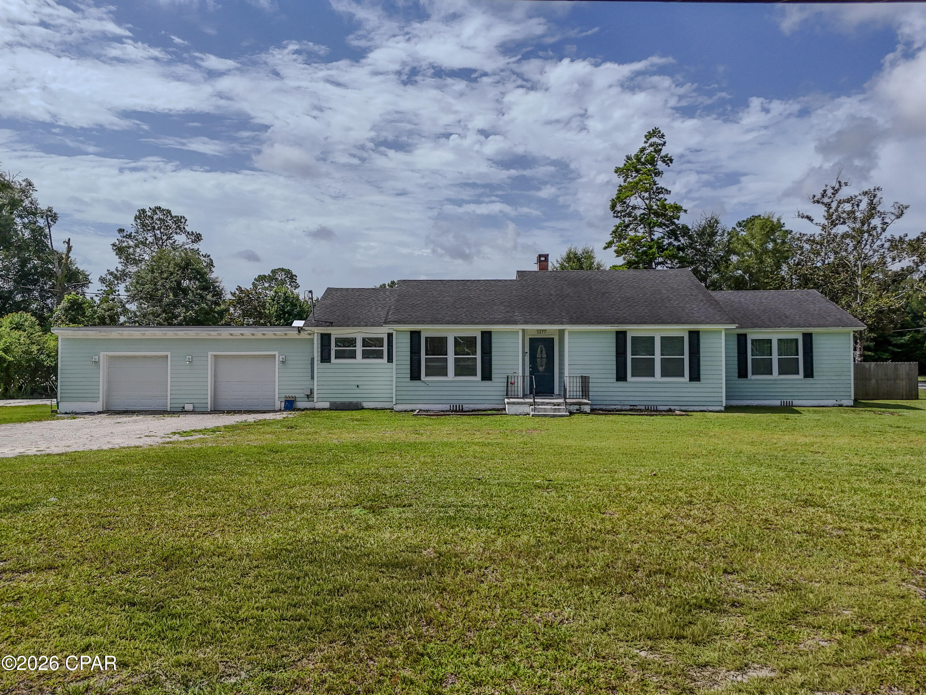 **Preferred Lender credit $2,000 towards closing costs** 

Beautifully renovated 3BR/2BA home on a spacious 3/4-acre corner lot! Rebuilt after Hurricane Michael with updated plumbing, electrical, flooring, fixtures, roof, HVAC, and water heater. Open-concept floor plan features granite countertops, soft-close cabinets, stainless steel appliances, and an oversized walk-in pantry. Wood-look porcelain tile and crown molding throughout. Spacious primary suite with dual walk-in closets and tiled shower. Large fenced backyard, oversized 2-car garage, impact sliding doors, and back deck make this move-in-ready home perfect for everyday living and entertaining. Concrete pad on side of garage for boat, trailer, or rv storage (no hookups). Fireplace is non-functional.