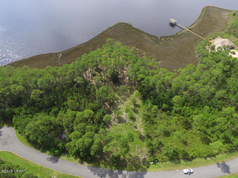 Best Waterfront homesite in Laird Bayou is now available! Over 2 acres! Experience Panoramic views of Laird Bayou and Cooks Bayou. True year round deep water access. Bring your cruiser or sailboat. Boat Launch in the community as well as RV and Boat storage. Laird Bayou is a beautiful gated waterfront community full of custom homes. This gated community offers pool and bath house, gazebo, day dock, and mail kiosk. Schedule your visit today!!