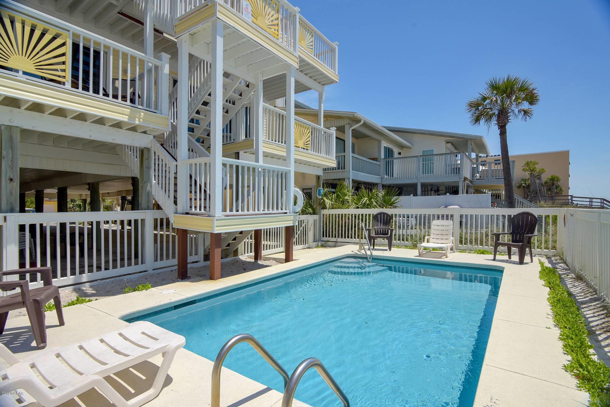 This is a beautiful Beach Front Home. 8 bedroom and 8 bathroom with a Gulf Front POOL!! The sellers are offering $100,000 to buyers with a full price offer to go toward remodeling!! The home is built on piling so the first floor starts on the second floor. This home has 4 kitchens, 4 living rooms that overlook the Beach and the Gulf! The bedrooms are so spacious that you can fit multiple beds in each. What a great home to have a family gathering. Or you can rent it for income. Either way you can watch the dolphins jump while relaxing on the beautiful decks overlooking the Beach and the Water.