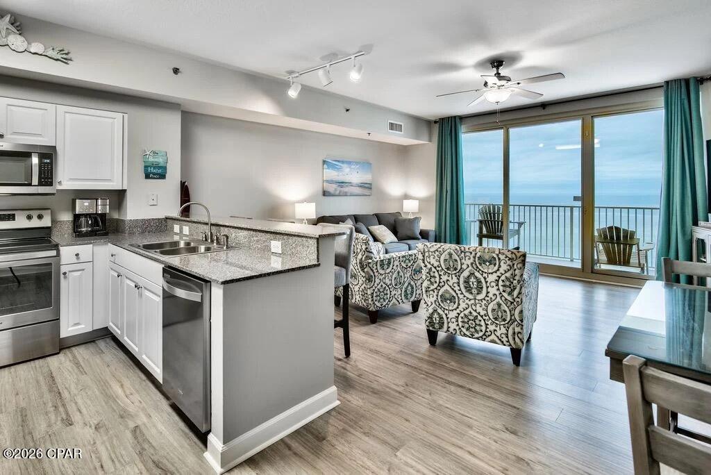 RENTAL MACHINE:  
2025 Gross - $58k+
2024 Gross - $59k+
2023 Gross - $60k+
...... TRUE GULF-FRONT!   Beautiful 1bd + Bunkroom with 2 full bathrooms.  One uniform floor through-out.   Stainless Steel appliances.  FULLY FURNISHED AND RENTAL READY.   Make sure to get this one on your list to see.  INCLUDES DEDICATED PARKING ON THE SAME FLOOR.   Park and walk right over to your condo.   NEW HVAC in 2024, New TV in Master Bedroom.  New Fridge in 2024.   All other appliances and water heater 2019.  Bunkroom has door added.  Bunkroom shower has glass door added.