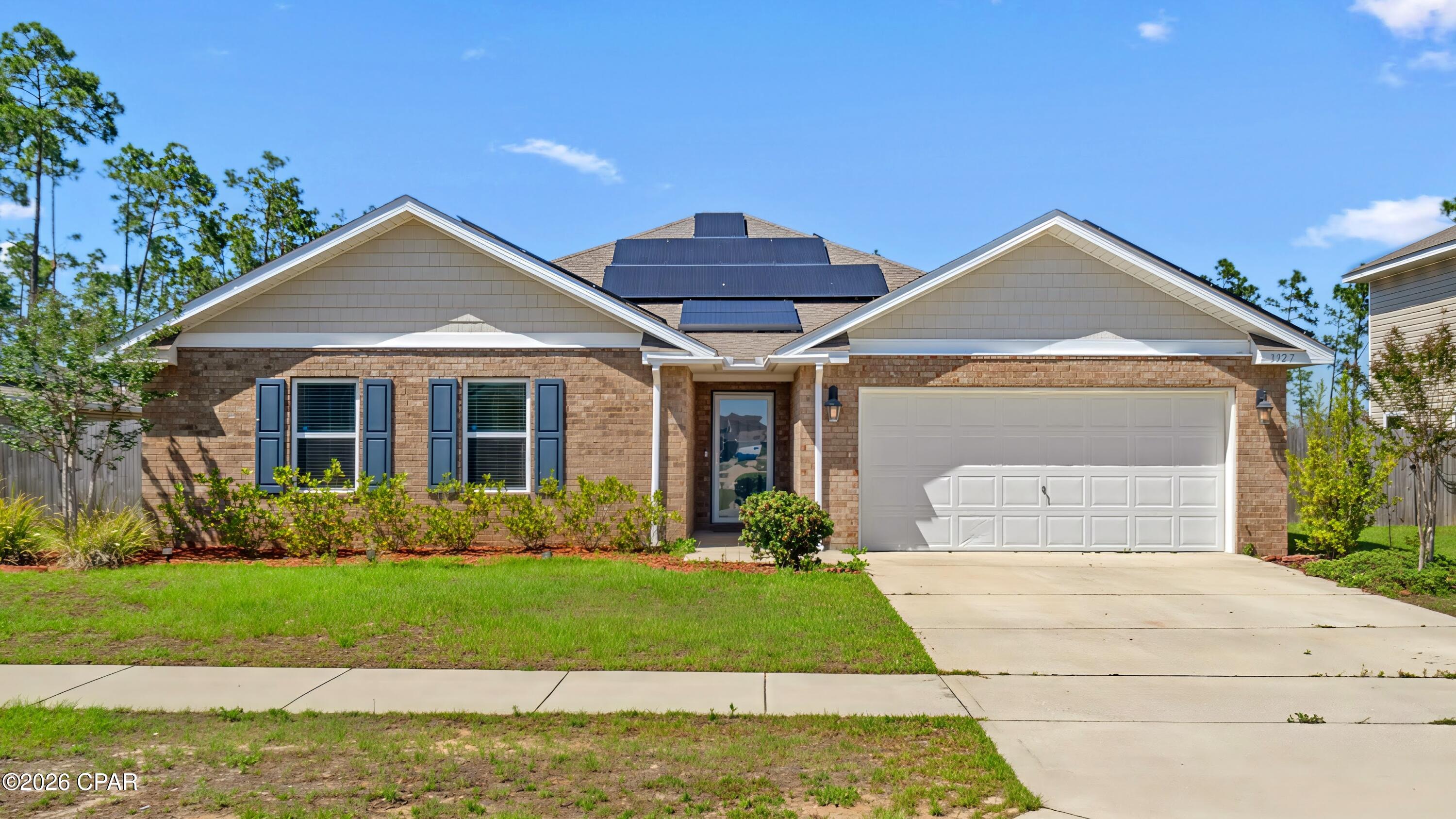 Assumable 2.375% VA loan! Welcome to a beautifully maintained 4-bedroom, 2-bath home in the desirable Magnolia Hills community. This floor plan perfectly balances comfort and functionality with an open-concept layout and a separate primary wing. The spacious kitchen is the heart of the home, complete with a large island, ample cabinetry, and seamless flow into the living and dining areas - ideal for both entertaining and everyday living.

The private primary suite offers a relaxing retreat, while three additional bedrooms provide excellent flexibility for guests, a home office, or dedicated hobby space. Step outside to enjoy the screened-in back porch overlooking the fully fenced backyard, perfect for pets, outdoor recreation, gardening, or gatherings.

Additional highlights include solar panels (fully paid off at closing) for improved energy efficiency, a 2-car garage, extra driveway parking, and a storage shed. Conveniently located near Tyndall Air Force Base, shopping, dining, and local beaches, this move-in-ready home combines modern comfort with everyday practicality. Don't miss your opportunity to make this Panama City property yours!