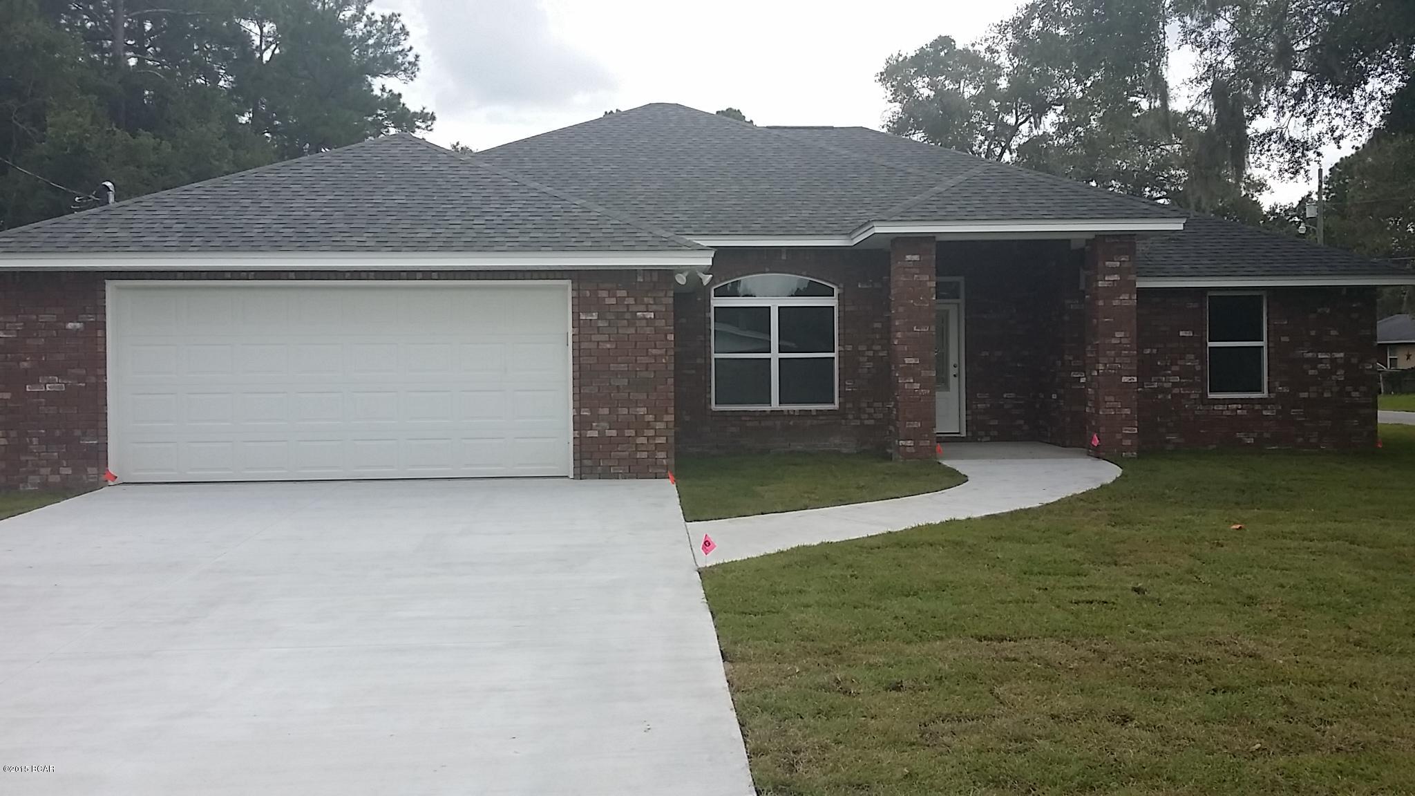 All brick! New Construction! 4 bedrooms, 2 and a half baths. Many upgrades. Gulf Power EarthCents home. House was built and insulated for maximum energy efficiency, hot water heatpump that uses about a fifth the energy of a traditional water heater, upgraded HVAC system. Very large bedrooms. Hall bath is so large you may mistake it for the master. Both bathrooms are very spacious and boast double vanities and oversized 6 foot soaker tubs with tiled walls, master has large separate tiled shower. Acid stained flooring throughout. Beautiful all wood maple cabinets in kitchen and bathrooms with upgraded granite counter tops (not builder’s grade). Driveway has been widen for more parking. Hot water heat pump cools garage as it heats water. Owner/Builder is a licensed Florida Real Estate Broke