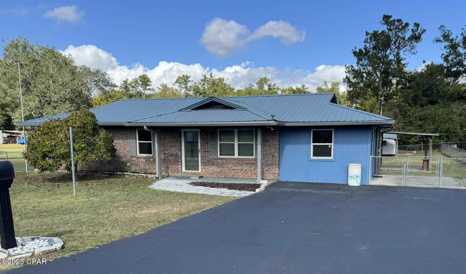 Are you ready for your first home or are you needing to downsize? Check out this well-maintained three-bedroom, one-and-a-half-bathroom home! This home is turn-key with appliances, including refrigerator, stove, and microwave. The huge fenced backyard is ready for your pets, children, or both! Also, there is a 21x15 shed for storage. The windows are just 2 years old, the roof is just over seven years old, the HVAC is approximately five years old, and a new hot water heater was installed last week! Located in a great and safe location on a dead-end road, you can walk to the Dollar General, a convenient amenity that many appreciate. Centrally located in the heart of Sneads, this home offers the perfect blend of comfort and convenience.