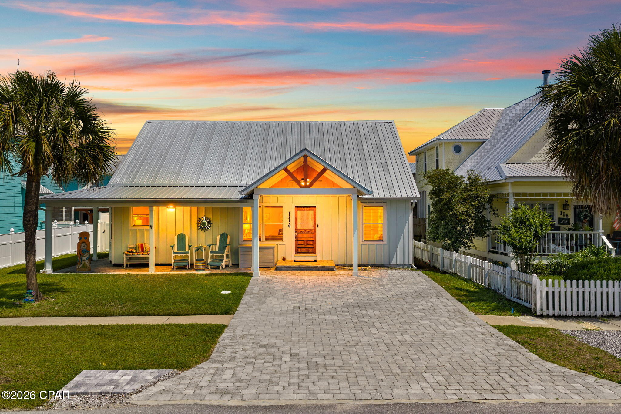 Welcome to 114 Bid A Wee Lane, a beautifully updated 3-bedroom, 2-bath home located in one of Panama City Beach's most sought-after beachside communities. Just a short walk to the sugar-white sands and emerald waters of the Gulf of Mexico, this move in ready home offers the perfect blend of coastal charm, comfort, and convenience. Inside, you'll find a completely updated interior featuring an open floor plan ideal for entertaining and everyday living. The spacious layout offers abundant natural light, generous storage throughout, and ample closet space rarely found in beach properties. Outside, there is plenty of parking for guests, boats, or beach toys, making this home ideal as a primary residence, second home, or investment property. Pictured is the public beach entry, but owners in Bid-A-Wee enjoy access to a dedicated private beach area, adding even more value and exclusivity to this incredible location. Conveniently located near shopping, restaurants, and entertainment, providing all that Panama City Beach has to offer. This home places you right in the heart of one of the area's most popular and desirable neighborhoods. Whether you're looking for a full-time coastal retreat or the perfect beach getaway, 114 Bid A Wee Lane is a must-see
