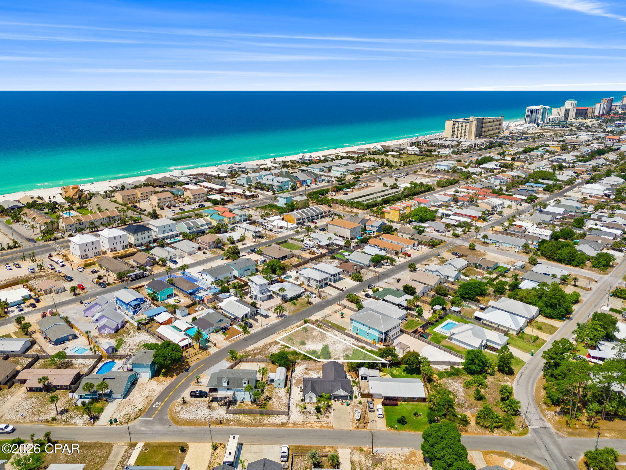 Ready for you to construct your beach home/homes located just a 7 minute walk or 2 minute golf cart ride to the beautiful white sand and turquoise water of the Gulf. Closest Beach Access is #4. Builders, this lot is level, deemed high and dry, and located in a desirable pocket of Panama City Beach. Enjoy NO HOA and STVR ability. Zoned R-3 allowing single family, duplex, triplex or quadraplex constructions. Personal enjoyment + excellent income potential! Walk to famous Schooners beachfront restaurant! Close proximity to St. Andrews State Park and Treasure Island Marina. A 7 minute drive to the new Tootsies Orchid Lounge beach front music venue! Sewer connection available. Larger Lot next door (5224 Sunset Ave MLS I.D. 789493) is also available for purchase (both lots combined total 0.21 of an acre). Seller will consider package price to convey both lots to buyer. Sign on property. Information provided is deemed accurate and reliable. Buyer to complete their own due diligence.