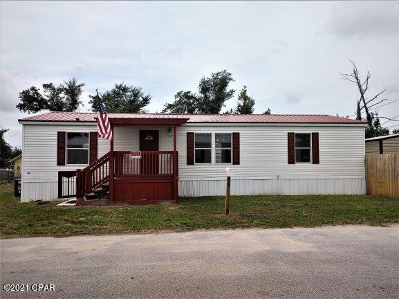 This newly remodeled 3 bed 2 bath doublewide offers an open spacious floor plan that has been completly remodeled. Vinyl Plank Flooring, new kitchen cabinets, granite counter new light fixtures, ceiling fans. Enjoy the front deck or the back yard that has privacy fence and a large shed. This immaculate double wide manufactured home sits on a corner lot and is waiting for you!! Located near all ammenites and short distance to both Bases, St. Andrews Area and beautiful Beaches.