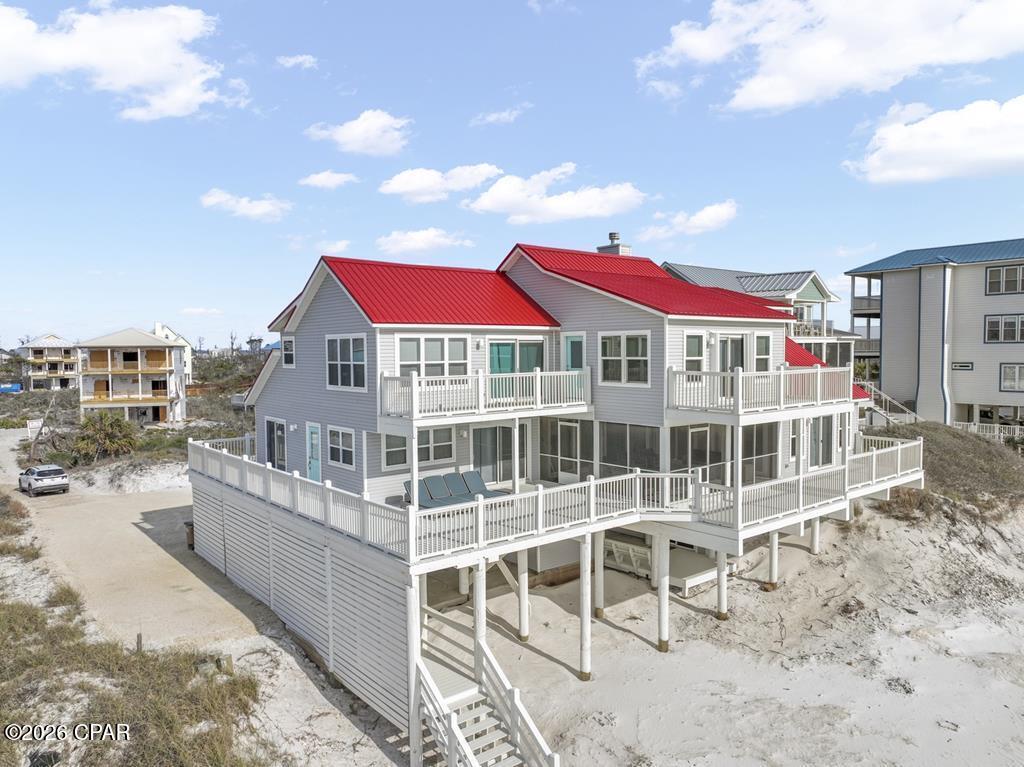 Under contract - taking back ups! Rare opportunity to own a one-of-a-kind Gulf front retreat in one of CSB most desirable settings & also arguably the best value for a beachfront home on a large parcel on the North Cape, with some of the nicest beach & water found anywhere. Perfectly positioned on an extraordinary 95' wide, sugar-white Gulf frontage, this extensively updated coastal estate was designed for true beachfront living--not just maximizing beds, but maximizing the N Cape experience. This home has been owned & meticulously maintained by just 2 families since built & allows the buyer flexibility for personal enjoyment or immediate income potential. With over 3,800 interior sq ft & 4,000 sq ft of outdoor living space, the layout of the home & its expansive Gulf-front decks allow for unparalleled & forever views of the Gulf & sunsets not found anywhere along CSB. Multiple private & comfortable gathering spaces allow owners/guests to spread out, relax & enjoy the coastline. Thoughtfully crafted with quality finishes, the interior showcases tasteful coastal décor & is being sold fully furnished/turnkey. Major improvements since 2021 & newer include •New decks, railings, exterior stairs & gutters •Updated HVAC systems •New appliances •New Fireplace •New floors •New furniture •Numerous additional upgrades throughout. The large lot offers ample parking for multiple vehicles and potential space for a private pool, providing an opportunity to further enhance value and rental income. Currently not on a rental program, projections on file from $140k-$172k annually as configured and $193k-$236k annually with pool addition. Ample interior and exterior storage accommodate beach gear & owner closets with ease. What truly sets this property apart is the expansive home & lot in a prime N Cape location adjacent to Cape Palms Park. This setting provides both additional space/convenient beach driving access to explore the coastline with ease in the included Polaris Ranger.