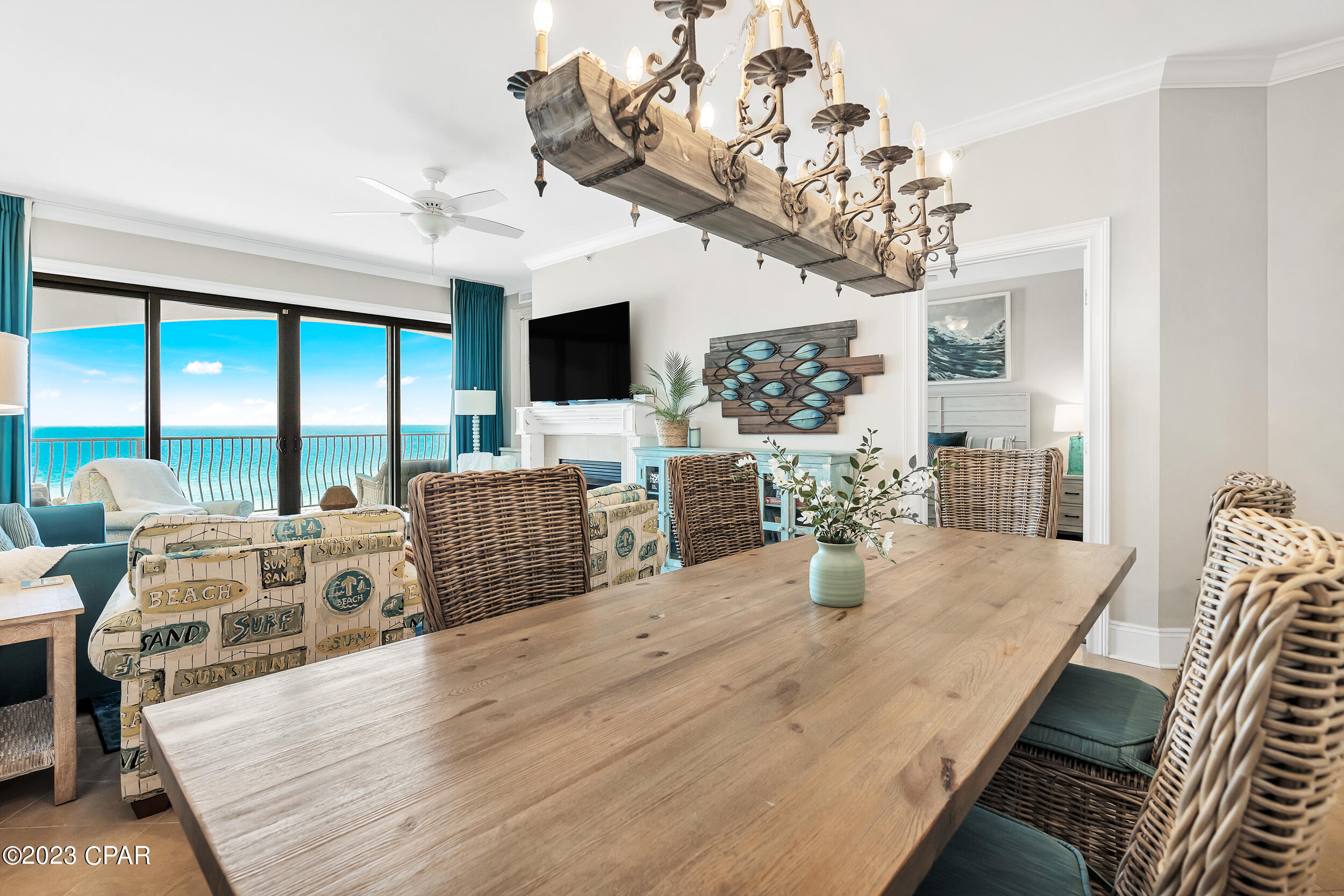 GULF FRONT GEM! TOP FLOOR unit available at the upscaled resort, Villa Coyaba. This 4 bed/3 ba has never been rented and is very tastefully decorated. Indulge yourself in luxury as you enter this spacious condo overlooking the Gulf of Mexico.  The living room and the primary bedroom lead out to a fabulous, oversized balcony offering breathtaking views while hearing the soothing waves. The living room has a fireplace that comes in handy during the holiday season.  The primary bedroom suite has a large bathroom with soaking tub and walk-in shower and the kitchen is well equipped with plenty of room for chefs creating fabulous meals. The additional two bedrooms can be used as junior suites, and the fourth bedroom is great for the kids to play and sleep in. Other features are laundry room with full size washer and dryer, ice machine, owners closet for storage, two designated parking spots in the garage. Villa Coyaba is a prestigious resort in Crystal Beach close to shops and dining. The resort offers a large gulf front pool, gym, grilling area and a theater. This unit is sold totally furnished and would make a great investment property, second home or primary residence. Projected income is $195K! Hurry before you miss out on this one!