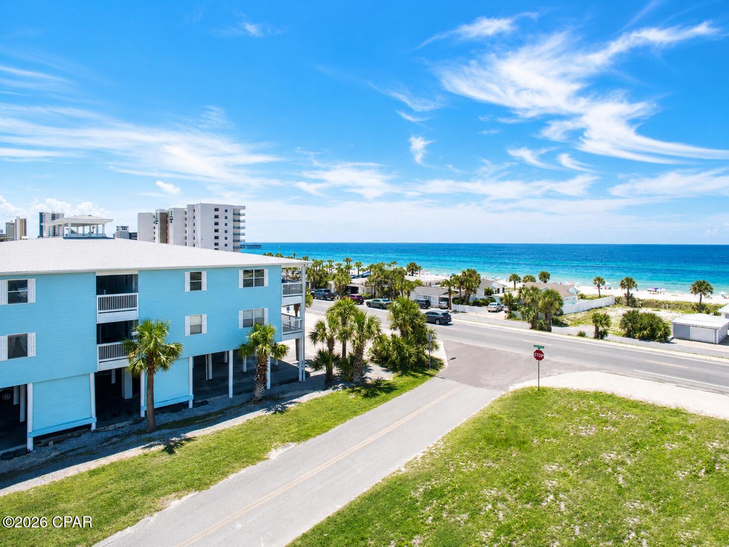 One of the LOWEST HOA'S on the beach!
The HOA fees are currently only $350 a month and paid quarterly. This pays for trash, water, pest control, building insurance and outside maintenance.
Spring/Summer 2026 already pre-booked.
PET FRIENDLY COMPLEX!
Somerset is a unique 16 unit low rise condo community directly across the street from the beach. No high-rise condo traffic or wait for the elevators. Location is perfect with 2 public beach entrances just steps away in between million dollar beach homes. Once you leave the parking area you are less than 100 yards from  the beach.
 PRIVATE COVERED PARKING for 2-3 cars. The covered parking is a BIG deal because you have a  designated area  large enough for 2-3 cars. Your vehicle is out of the sun during the hot summer months as well as the rain.
Walking distance to coffee, restaurants, bars, ice cream parlors and MORE!!
Convenient location in the middle of PCB, drive just  minutes to Pier Park or the marinas as well as other local attractions. Sold with high end LUXURY furnishings included! Fully stocked kitchen, appliances and renovations. Renovations include luxury plank flooring throughout. New paint, brand new quartz kitchen countertops, white painted cabinetry and stainless steel appliances. A LARGE bathroom that could be converted to two bathrooms in the future. The bathroom was recently renovated with shiplap, tub with handles and custom antique vanity/sink. Living room sofa set is high quality mid-century  modern brown  leather. All beds feature new comfort mattresses, luxury sheets and bedding. Enjoy a large spacious balcony that faces a residential area. Condo has 3 double beds and allows 6 guest. Also, entire complex is pet friendly for any size pet, a huge booking perk with extra income. 
DON'T MISS THIS OPPORTUNITY TO HAVE A TURNKEY READY PROPERTY ALREADY PRE-BOOKED AT CLOSING FOR SPRING AND SUMMER 2026.