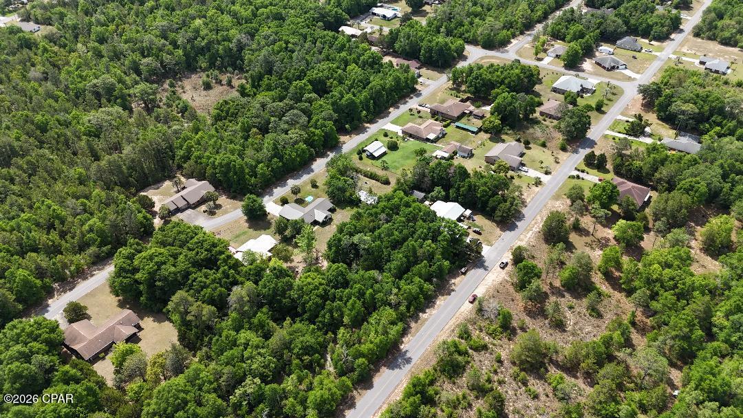 Build your dream home on this spacious 0.357-acre lot on Amy Lane in Sunny Hills, Florida. A peaceful, no-HOA setting surrounded by nature. Located in the desirable Sunny Hills area. Enjoy nearby lakes, parks, and the Sunny Hills Golf Club, all while being a short drive to Panama City Beach and local conveniences. A perfect opportunity to build, invest, or create your own quiet retreat.