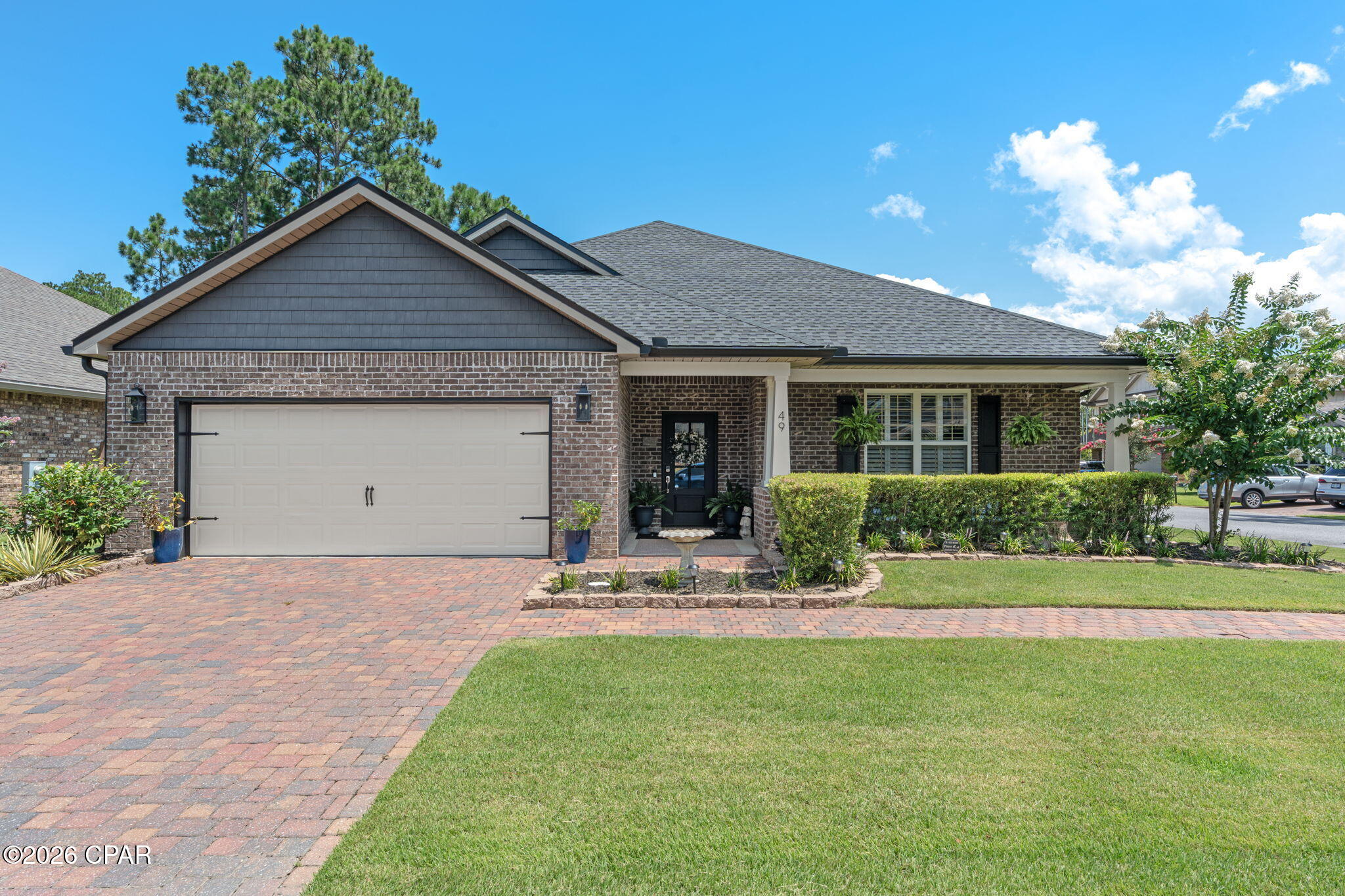 Welcome to this beautifully maintained 4-bedroom, 3-bath brick home offering 1,912 square feet of comfortable living in the well-established Harstvedt Plantation community. Inside, you'll find attractive wood-plank tile flooring, modern light fixtures, and a thoughtfully designed layout that blends style and functionality. The kitchen features granite countertops, stainless steel appliances, and a beautiful tile backsplash, creating the perfect space for both everyday living and entertaining. The spacious primary suite offers a relaxing retreat with a walk-in closet and an en-suite bath complete with double vanities. A new roof installed in 2024 provides added peace of mind and long-term value. Step outside to enjoy the screened-in back patio overlooking the fully fenced backyard, complete with an additional deck that's ideal for grilling, entertaining guests, or simply unwinding outdoors. Located in the well-established Harstvedt Plantation community, this home offers a low HOA fee and is situated in the desirable X flood zone, meaning flood insurance is not required. Enjoy being within walking distance of the bay and just minutes from Pilcher Park and the Cessna Landing boat ramps, providing easy access to boating, fishing, and waterfront recreation. You'll also love the convenience of being close to the shopping, dining, entertainment, and the sugar-white beaches of 30A and South Walton. Don't miss your opportunity to own this move-in-ready home in an exceptional location. Schedule your private showing today and discover all this property has to offer!