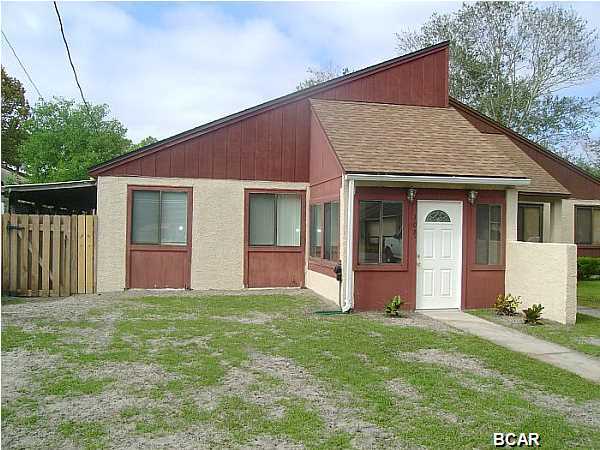 Very nice home with ceramic tile and wood floors, raised ceilings, separate laundry room, privacy fenced back yard, and close to Tyndall AFB.